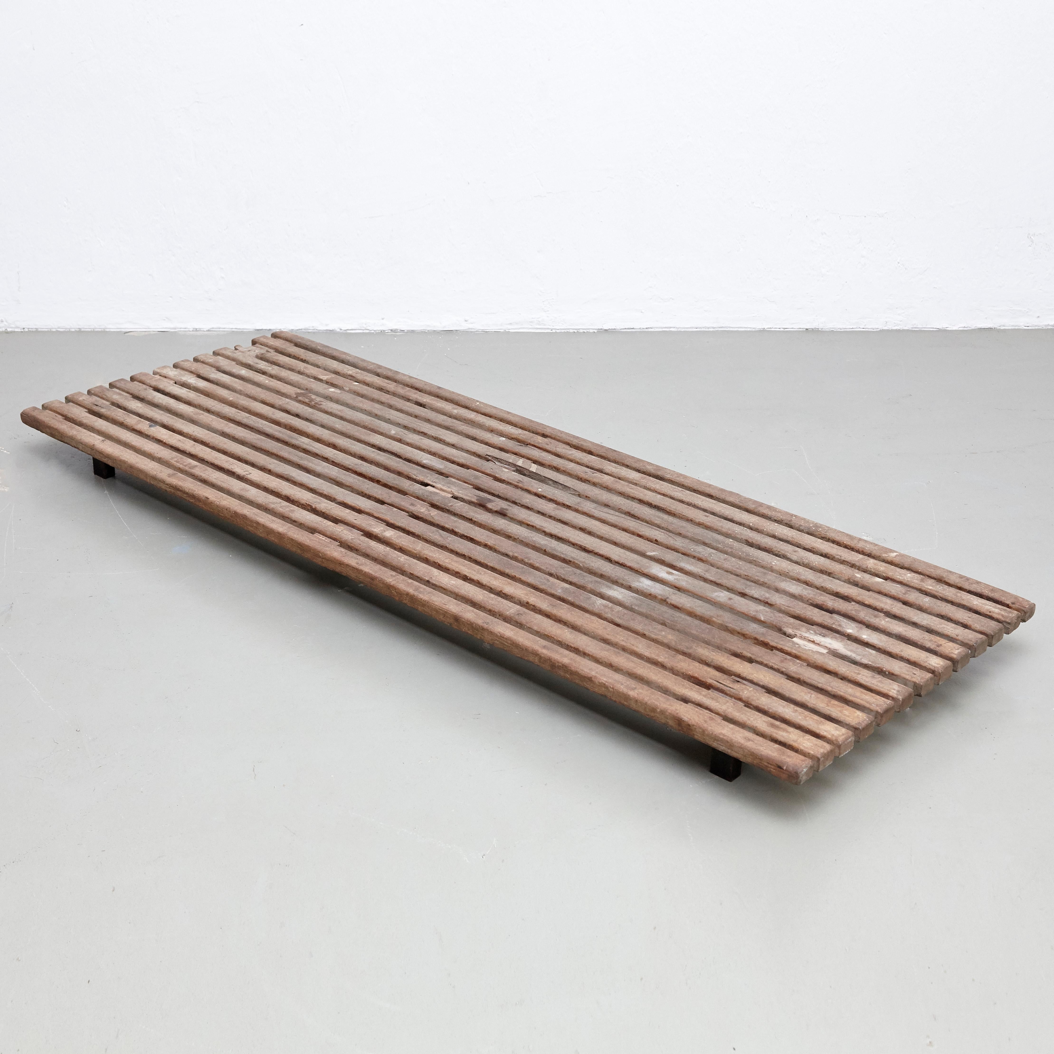 Bench designed by Charlotte Perriand, circa 1950.
Manufactured by Steph Simon (France), circa 1950.
Wood, lacquered metal frame and legs.

Provenance: Cansado, Mauritania (Africa).

In original condition, with wear consistent with age and use,