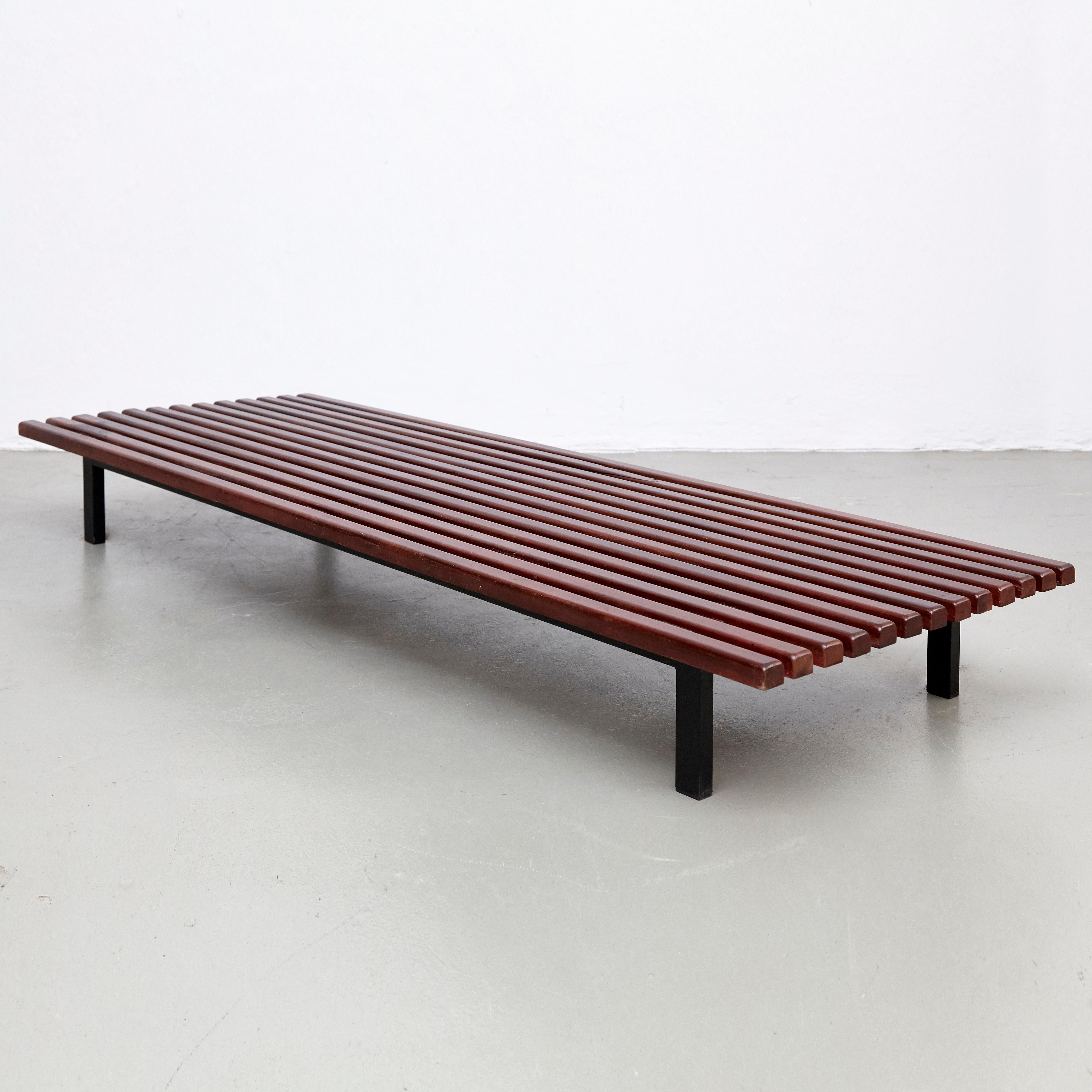 Bench designed by Charlotte Perriand, circa 1950.
Edited by Steph Simon (France)

Wood, metal frame legs has been redone according the original.

Provenance: Cansado, Mauritania (Africa).

In original condition, with minor wear consistent