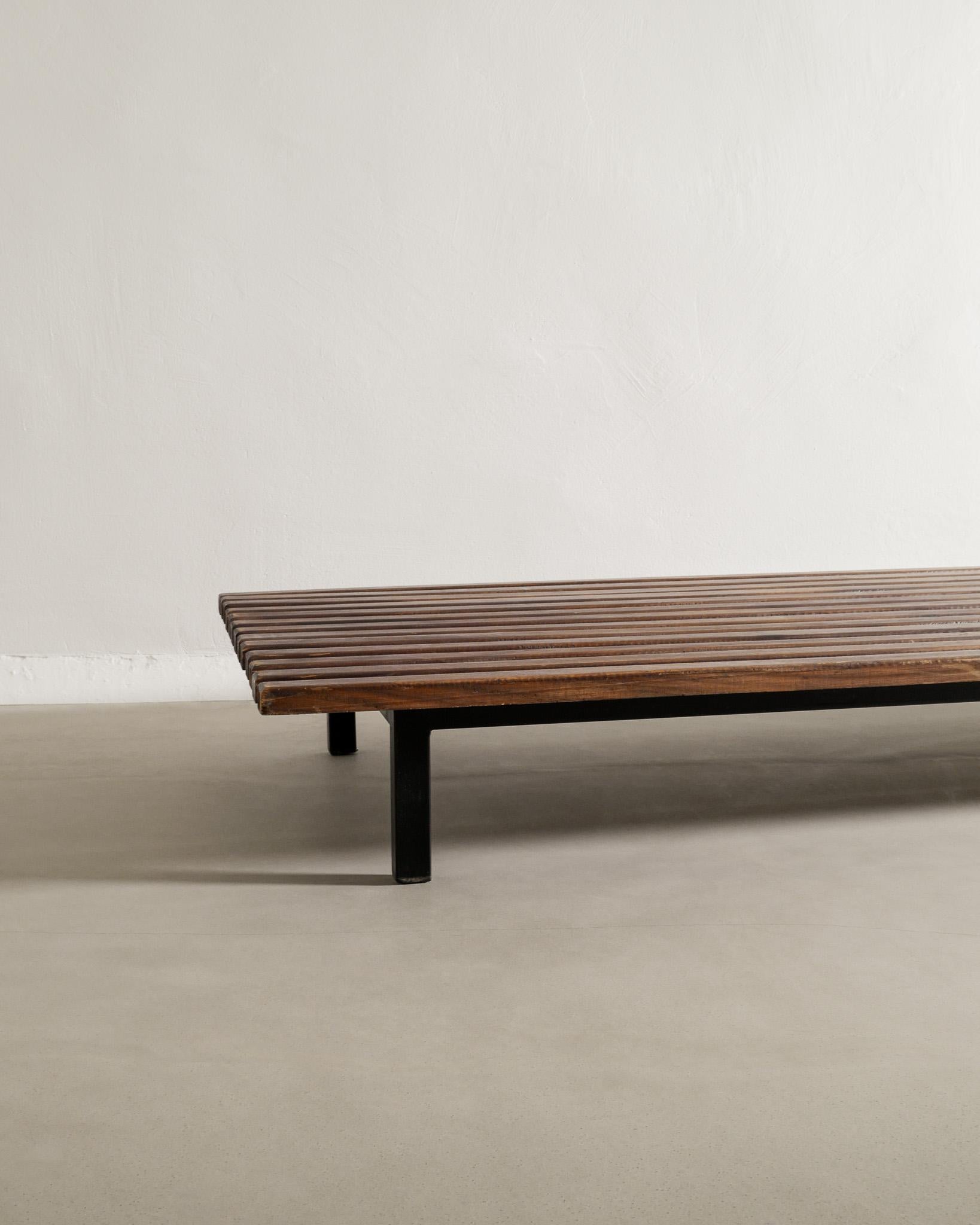 Rare Cansado bench / low table designed by Charlotte Perriand and produced by Steph Simon for Cité Cansado, Mauritania circa 1958. In good original condition with patina from age and use. 

Dimensions: H: 24 cm / 9.45
