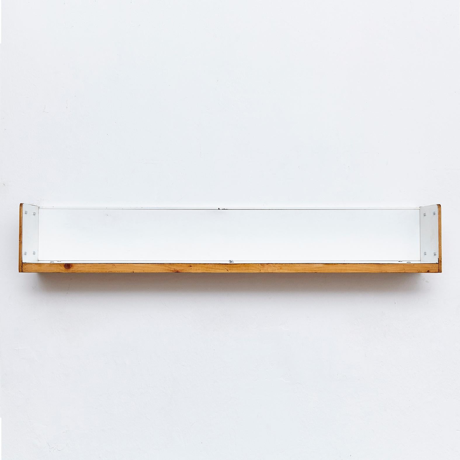 Shelve designed by Charlotte Perriand for Les Arcs circa 1960, manufactured in France.
Pinewood and metal 

In good original condition, with minor wear consistent with age and use, preserving a beautiful patina.

Charlotte Perriand (1903-1999):