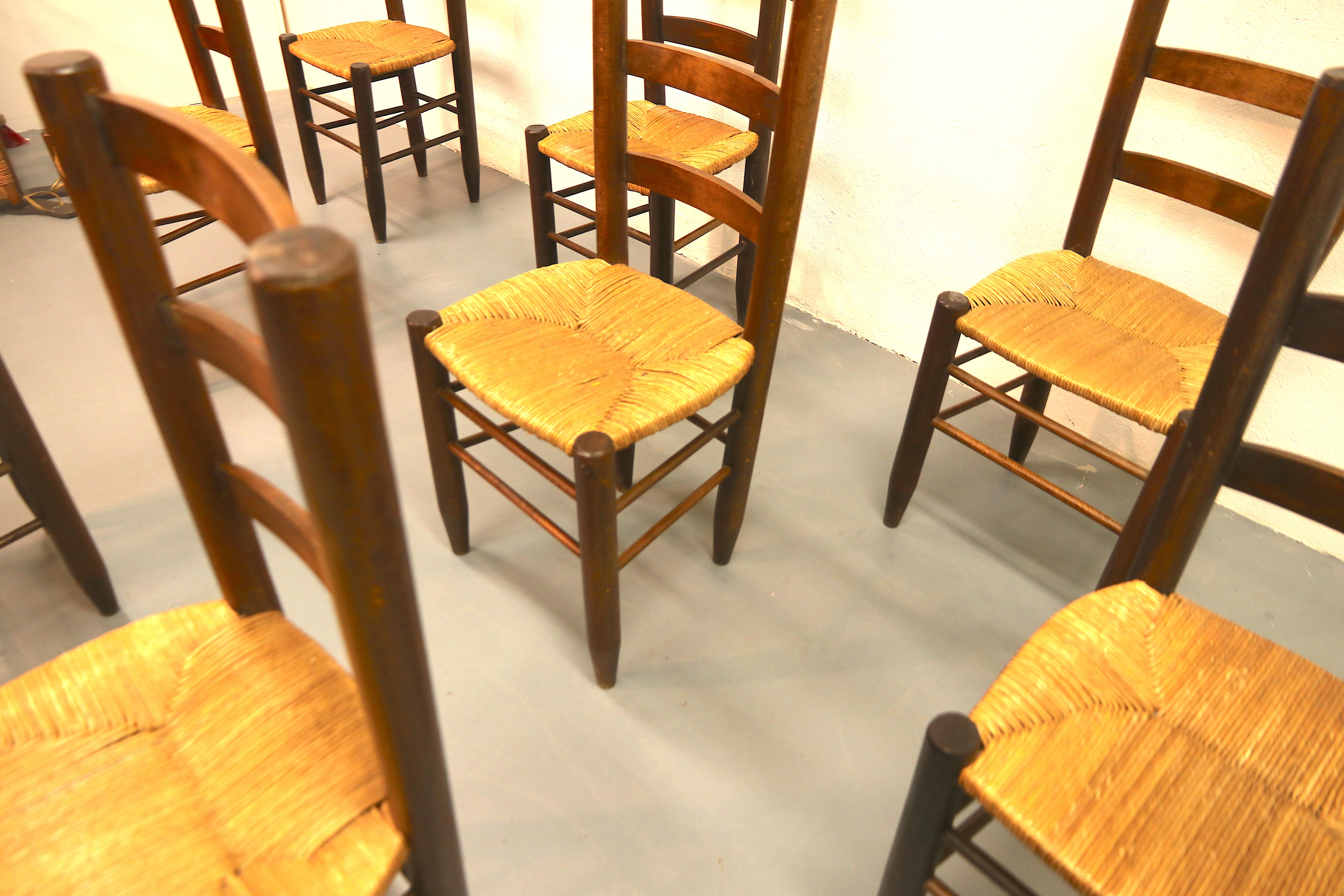 Mid-Century Modern Charlotte Perriand Model No. 19 Set of 8 Solid Wood and Rush Dining Room Chairs For Sale