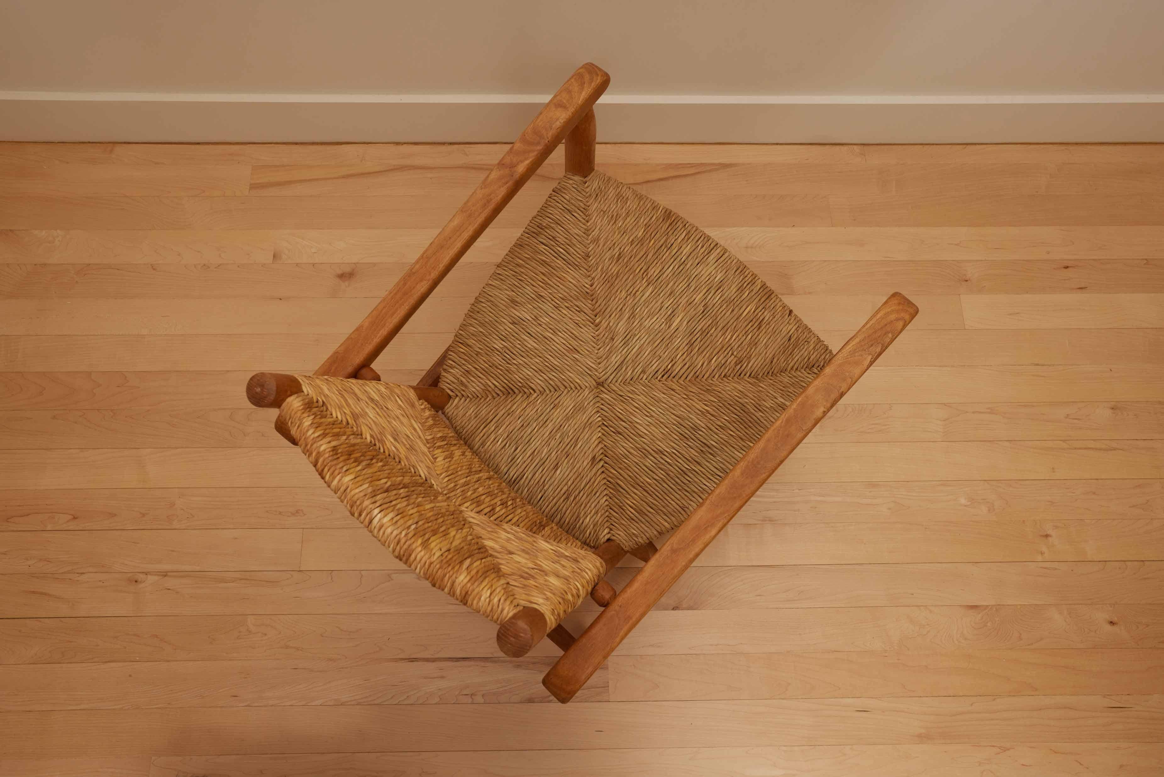 20th Century Charlotte Perriand. n°21 'Chamrousse' armchair. France. 1950