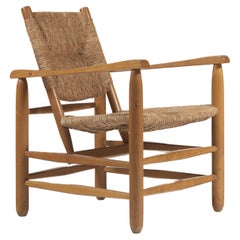 Charlotte Perriand. n°21 Sillón "Chamrousse". Francia. 1966