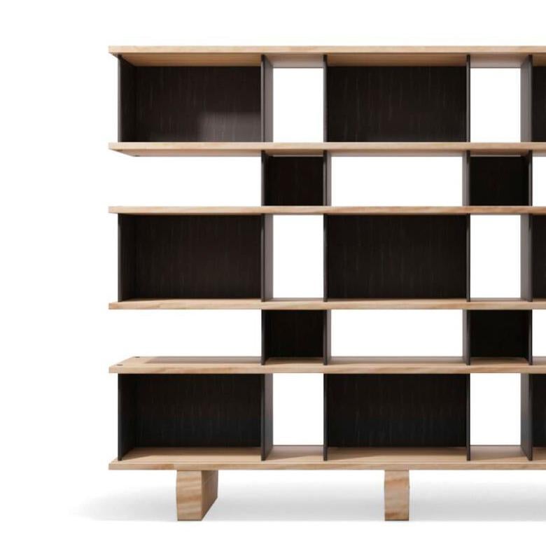 Shelving Unit midel Nuage designed by Charlotte Perriand in 1952-56. 
Relaunched by Cassina in 2012.
Manufactured by Cassina in Italy.

Authenticity and avant-garde characterise Charlotte Perriand’s Nuage shelving unit from 1940. Drawing on her