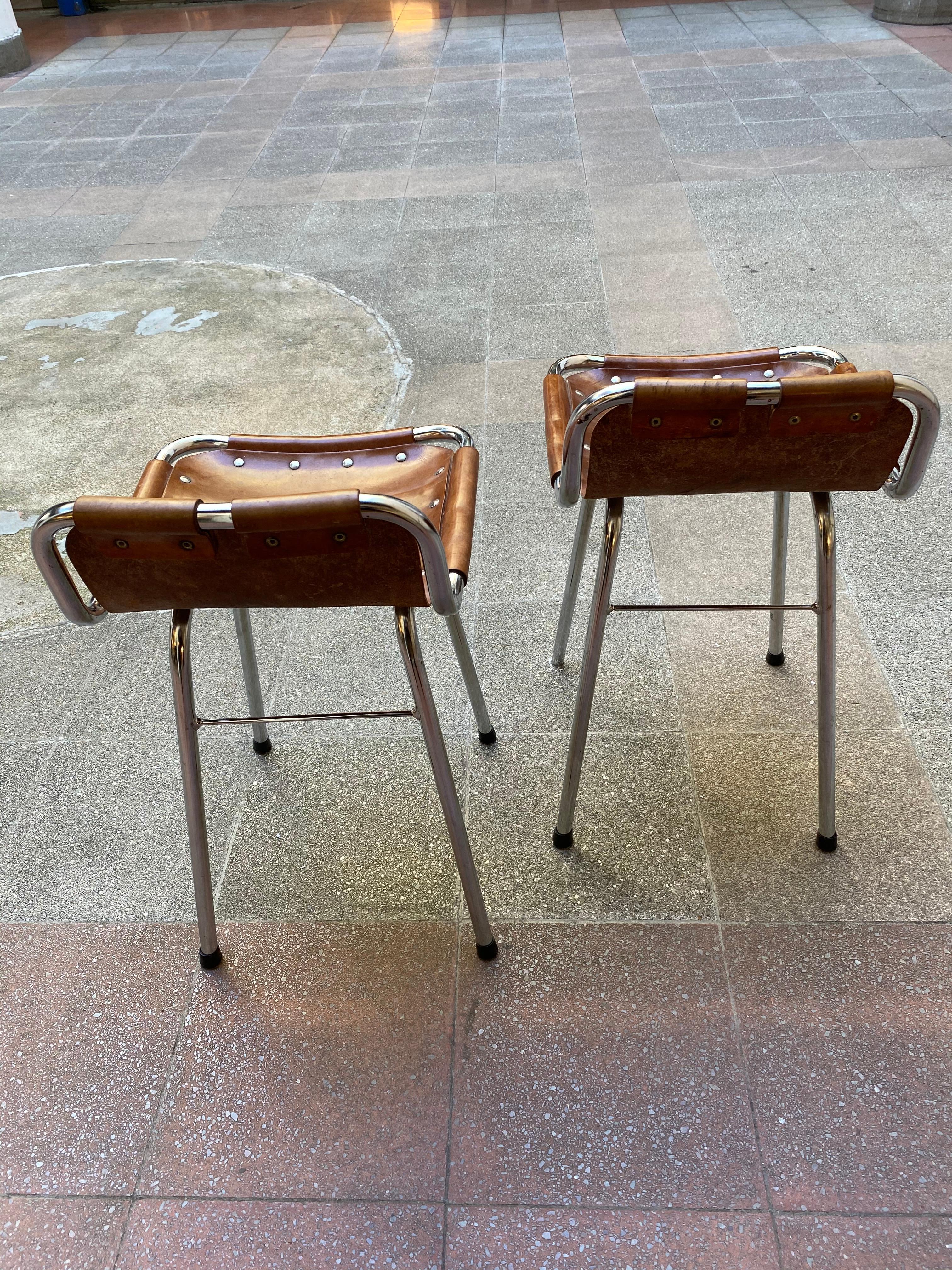 Charlotte Perriand
Rare. Pair of Les Arcs 1600 Stoolss, Cassina edition, circa 1969

Cowhide leather and steel

Size: Length 47 cm
Width 59 cm
Height 70 cm
Seat height 55 cm

Excellent condition
Selling price: 2600 Euros.