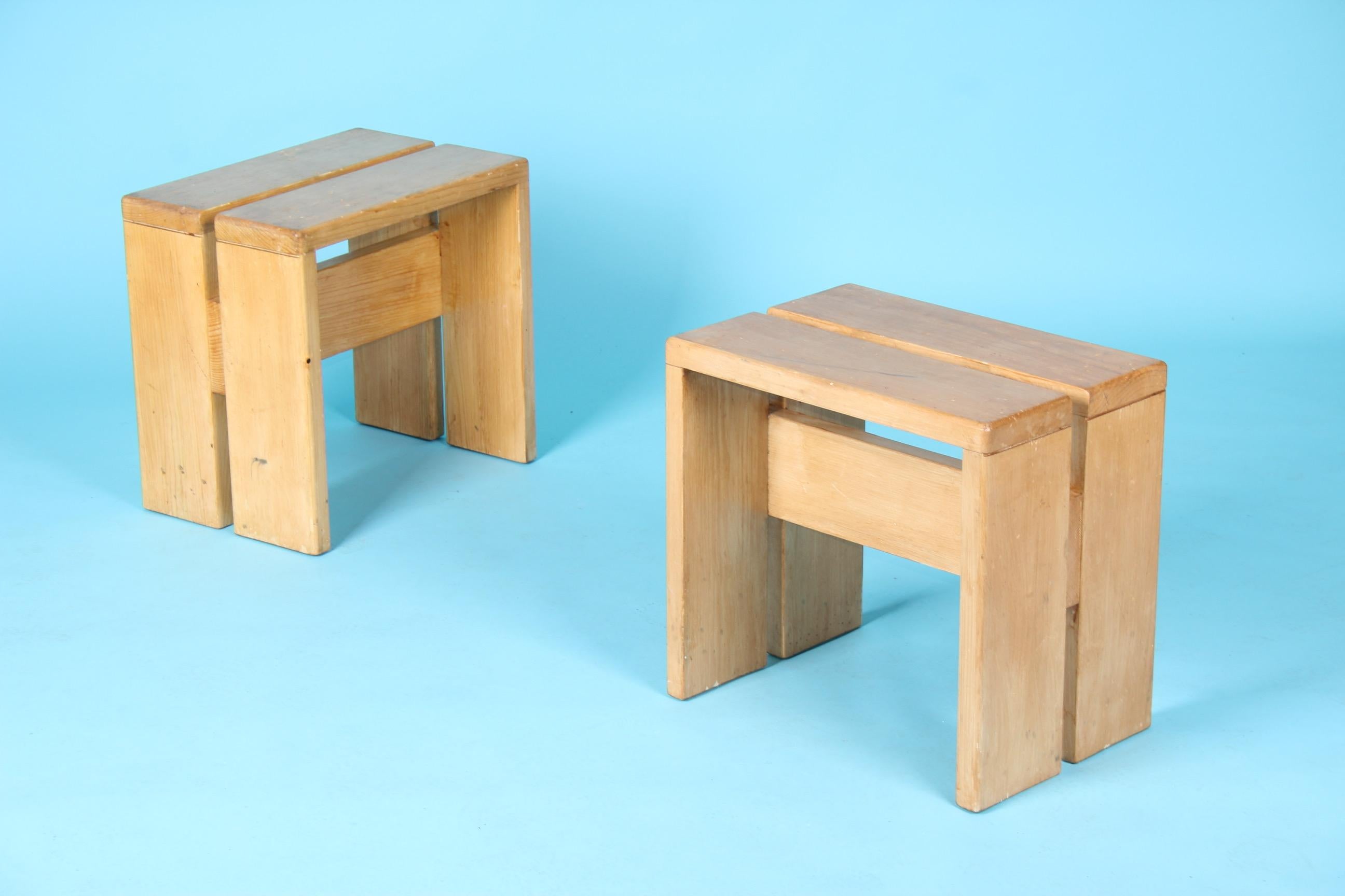 Charlotte Perriand pair of Les Arcs stools.