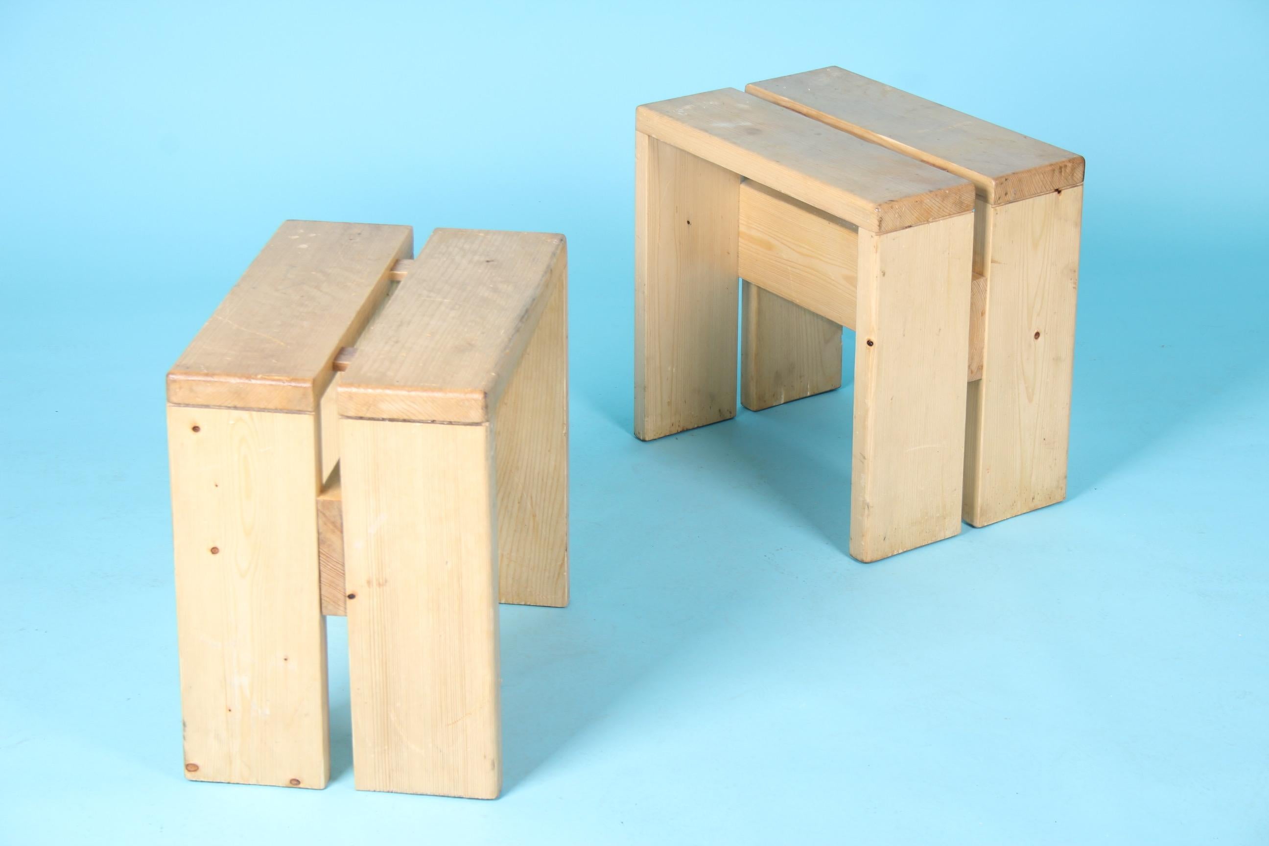 Charlotte Perriand pair of Les Arcs stools.