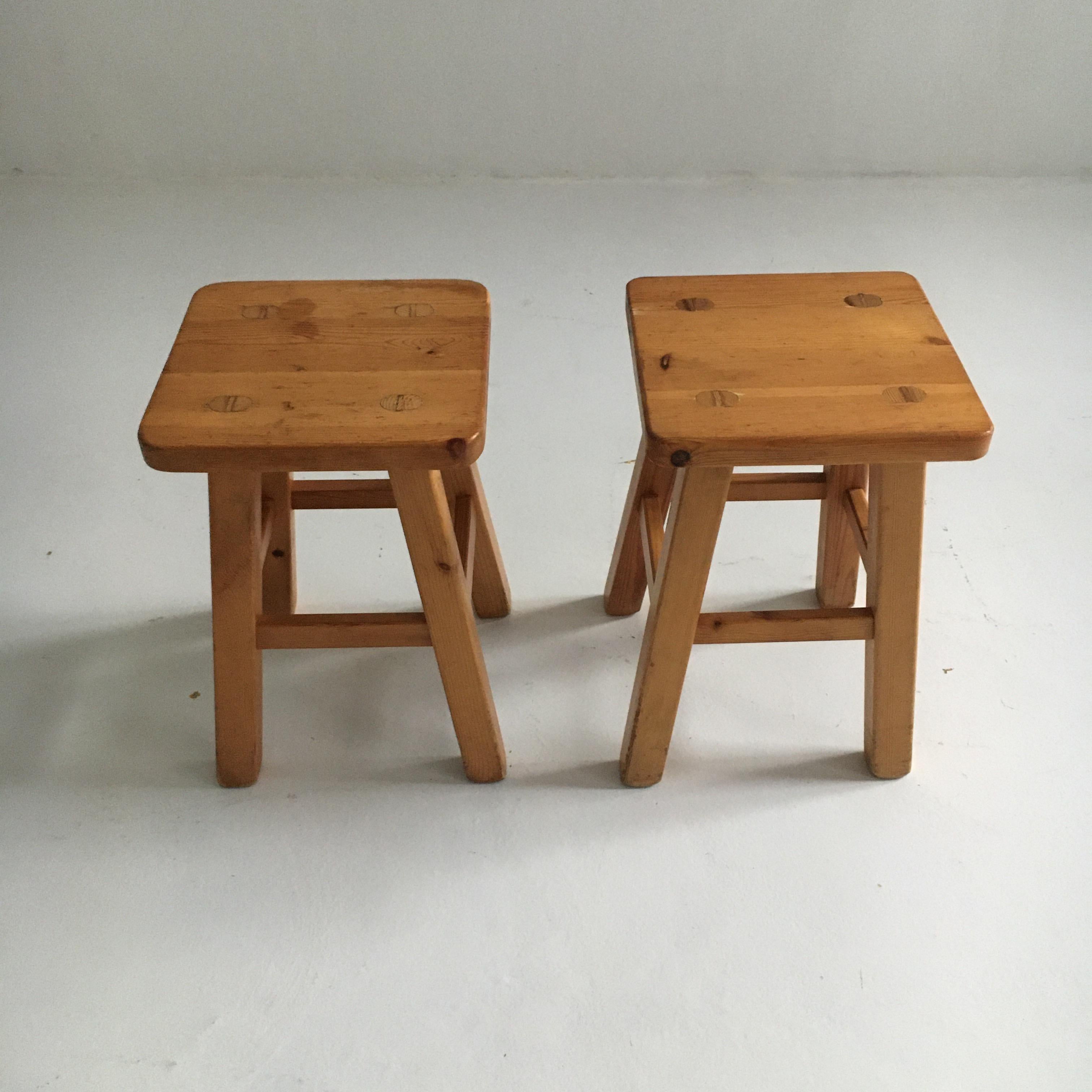 Charlotte Perriand pair of square pine stools, France, 1960s.