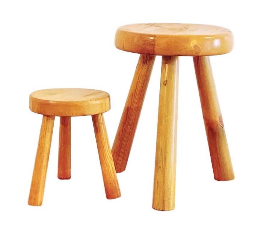 Classic wood stool by Charlotte Perriand for 'Les Arcs.' Three legged pine stool made for the French Ski Resort 'Les Arcs