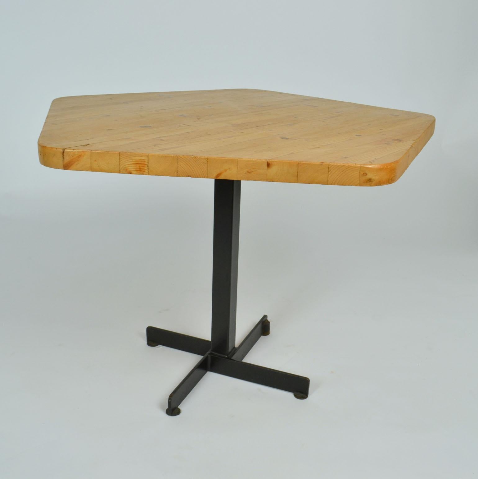 Mid-Century Modern Charlotte Perriand pine and petal pentagonal table for Les Arcs 1600 can be used either as a breakfast or small dining table. The pine table is Pentagonal in shape, standing on a black lacquered box metal base and star legs. The