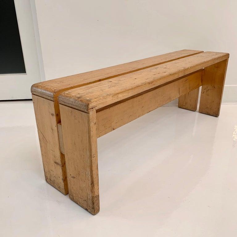 Classic pine, 3 seater bench designed by Charlotte Perriand for the Les Arcs Ski Resort in France. Just under 4 feet long. Varying patina and wear to each bench. 

2 benches available. Priced individually. 

  