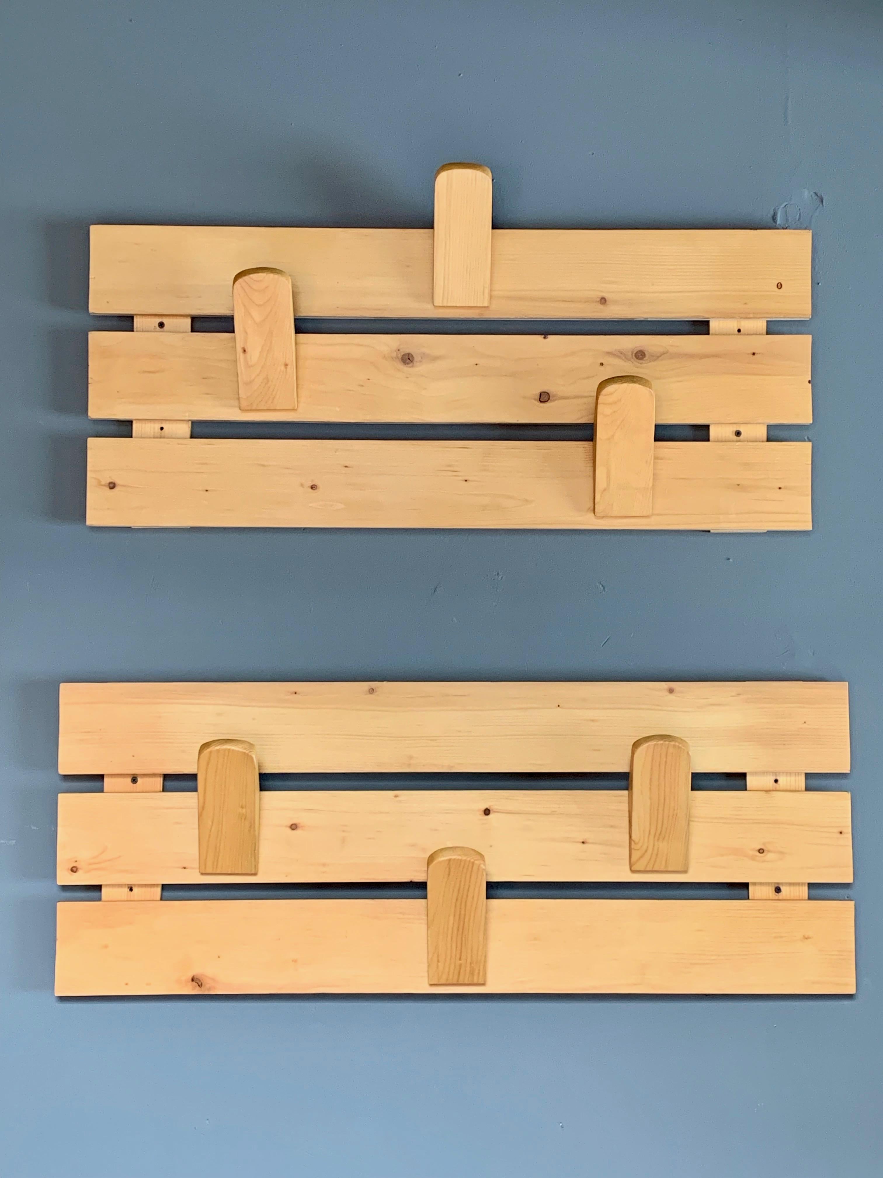 Super rare pine coat rack by Charlotte Perriand for Les Arcs. Taken out of a complete Les Arcs apartment in France. Pine frame with three movable, pine tongue hooks. Hooks can be placed anywhere on the coat rack. Great vintage condition.

Slightly