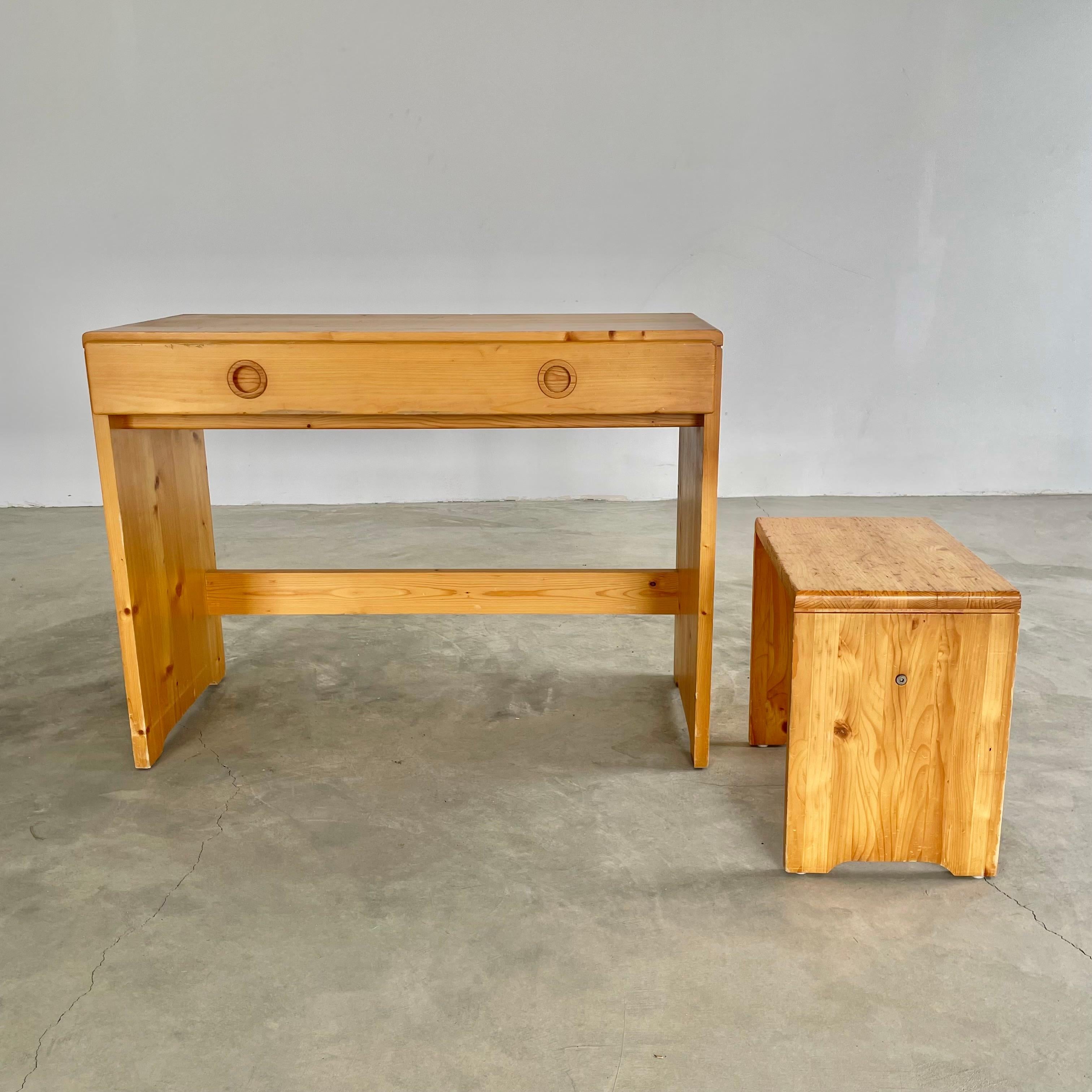 Rare Charlotte Perriand desk for Les Arcs. circa 1960s. Comes with matching stool. This gorgeous solid pine desk can be used as a console or writing desk. Beautiful vintage condition and wear. One single extra long drawer runs along the front of the