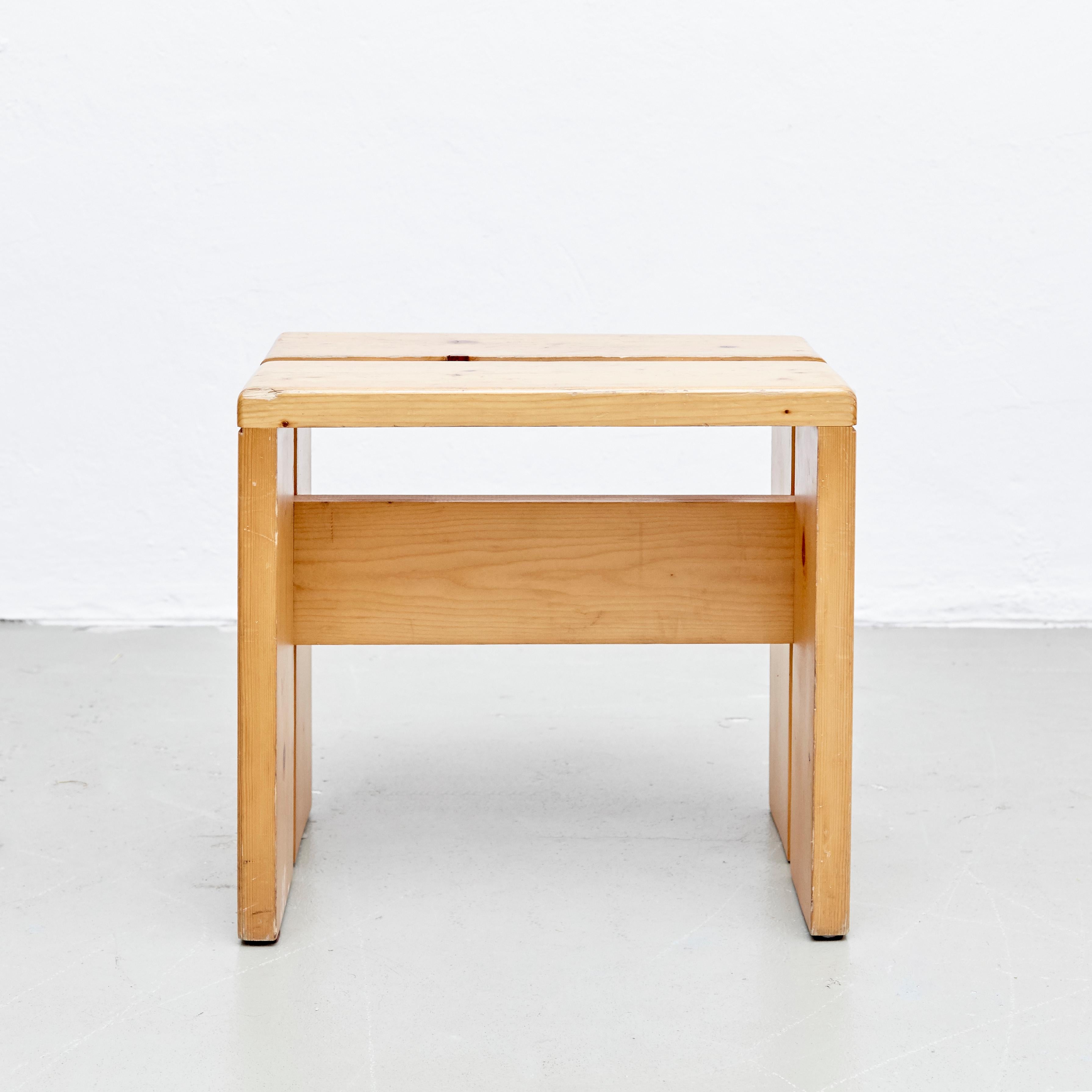 Stool designed by Charlotte Perriand for Les Arcs ski Resort, circa 1960, manufactured in France.
Pinewood.

In nice condition, with wear consistent with age and use, preserving a beautiful patina.

Charlotte Perriand (1903-1999). She was born