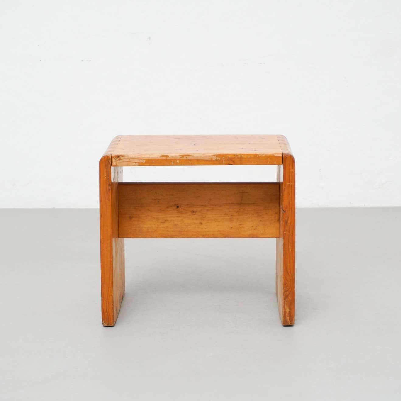 Stool designed by Charlotte Perriand for Les Arcs ski Resort, circa 1960, manufactured in France.
Pinewood.

In nice condition, with wear consistent with age and use, preserving a beautiful patina.

Charlotte Perriand (1903-1999). She was born