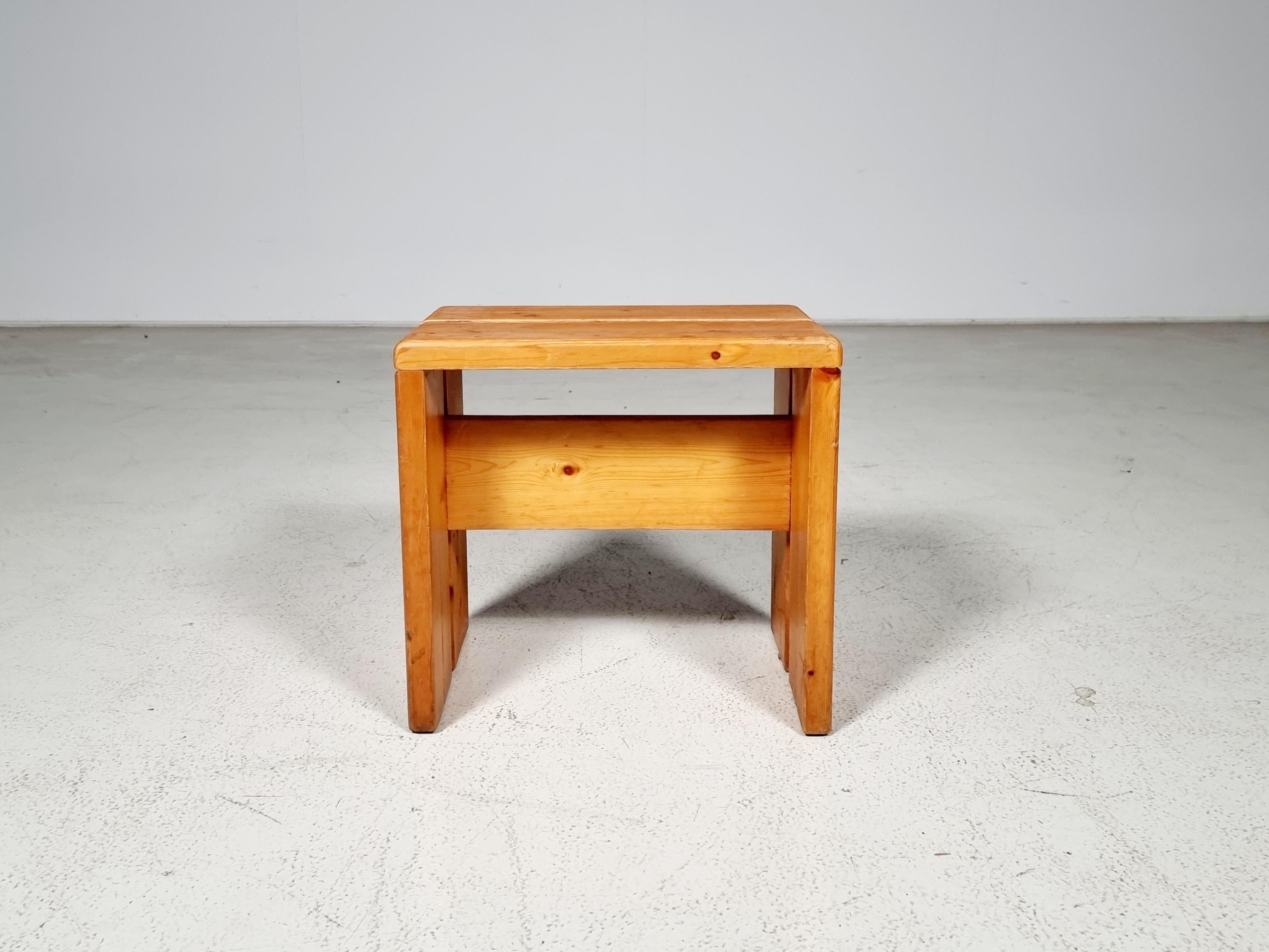 The pinewood stool is from the 1960s. Great lines and simplicity. Wooden cross brace under the seat and two pine studs in the stool's seat for added strength and support.