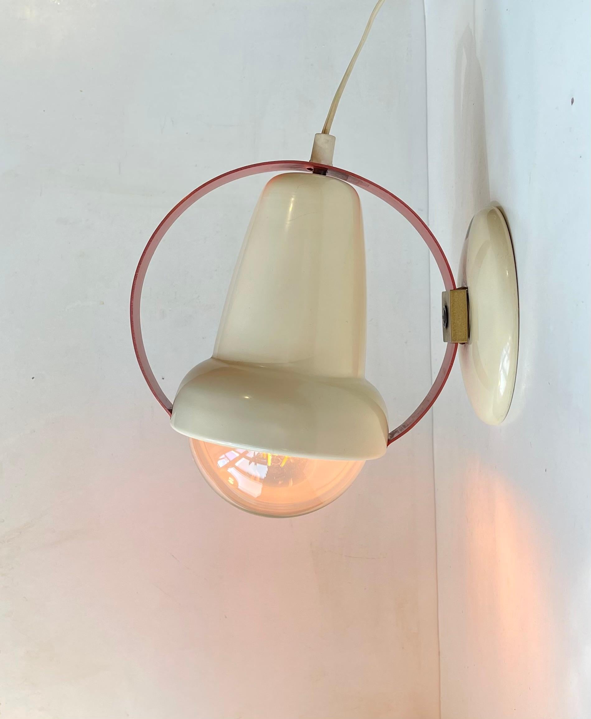 Original Charlotte Perriand sun-lamp (Type 7529) up-cycled to wall or table lamp by our in-house electrician. Everything is original besides the socket and its new maxi-bulb. It even retain its original cords/wire. The direction of the light can be