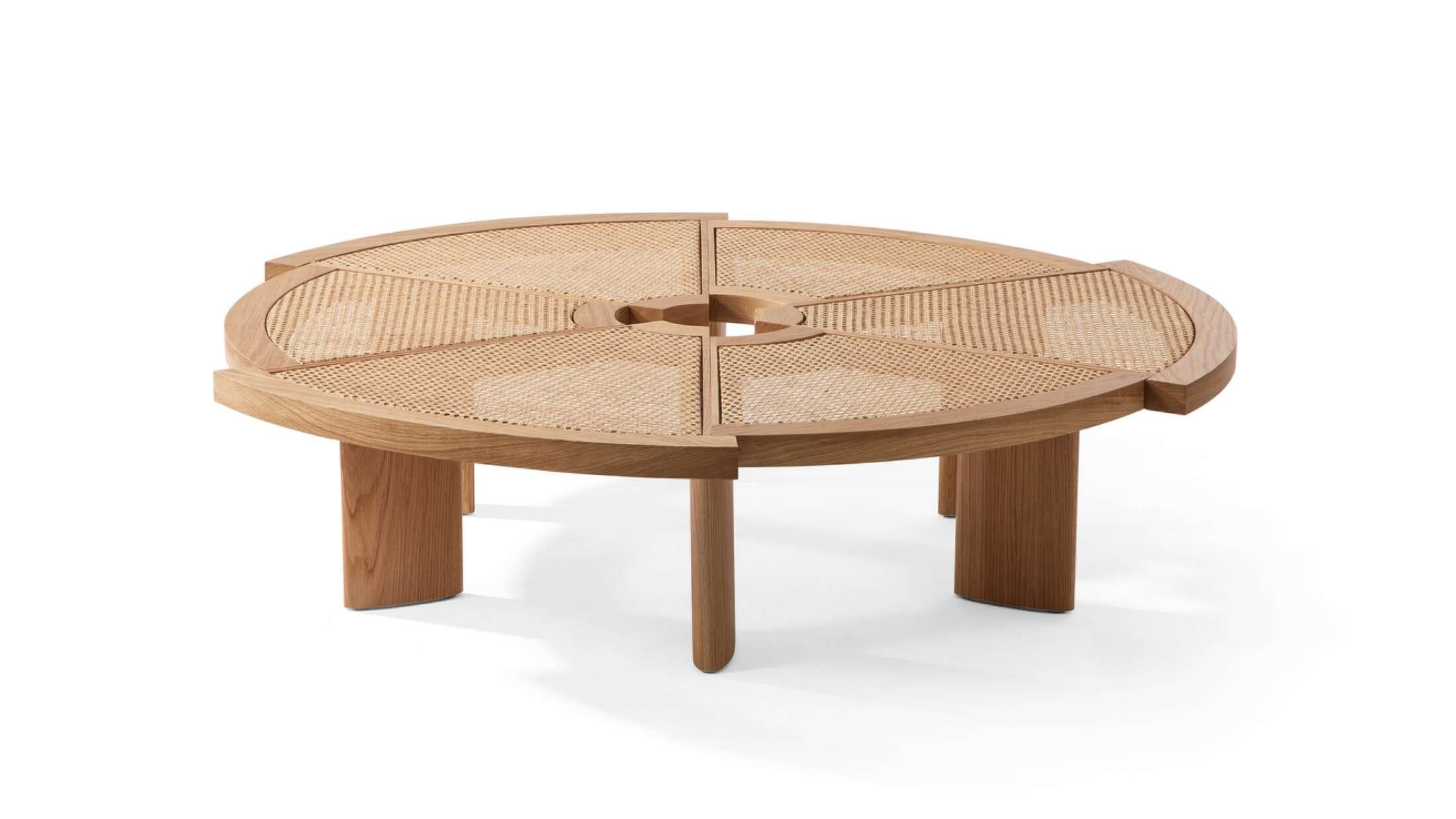 The price given applies to the piece as shown in the first picture. Please ask for pricing in other materials. Also available in marble. 

The low table by Charlotte Perriand is composed of six segments of different radius, arranged in a circle but