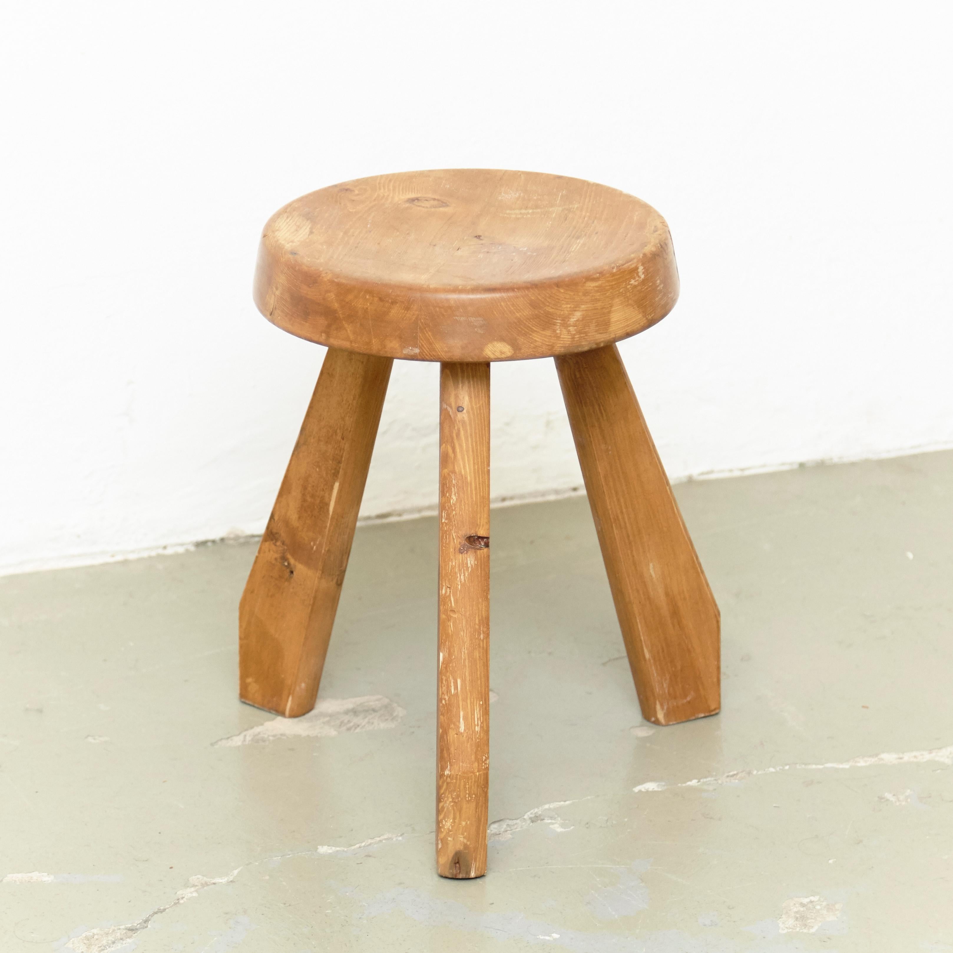 Stool, model Sandoz, designed by Charlotte Perriand, circa 1960.
Manufactured in France.
Pine wood.

In good original condition, with minor wear consistent with age and use, preserving a beautiful patina.

Charlotte Perriand (1903-1999). She