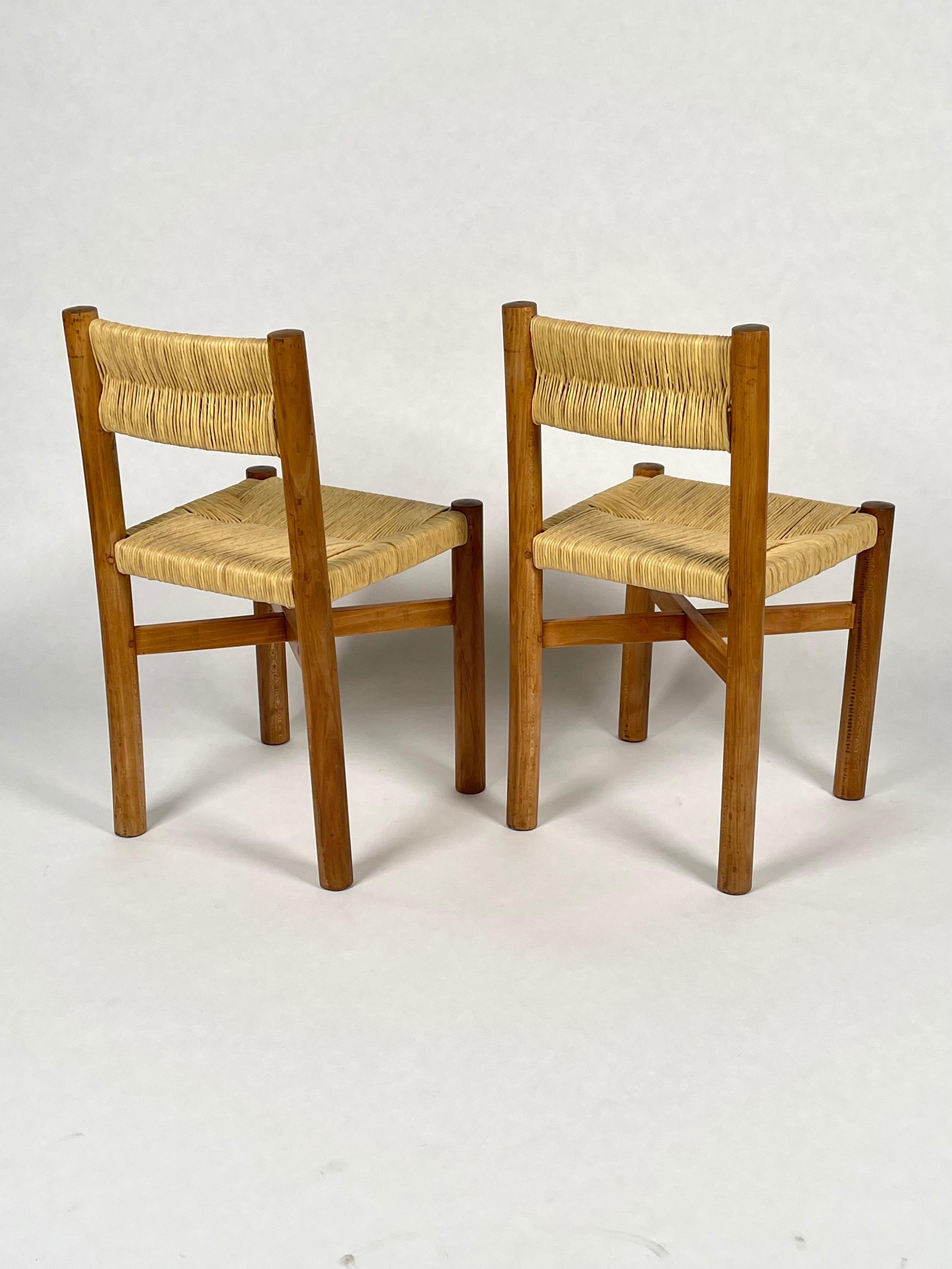 Milieu du XXe siècle Charlotte Perriand:: ensemble de 2 chaises 