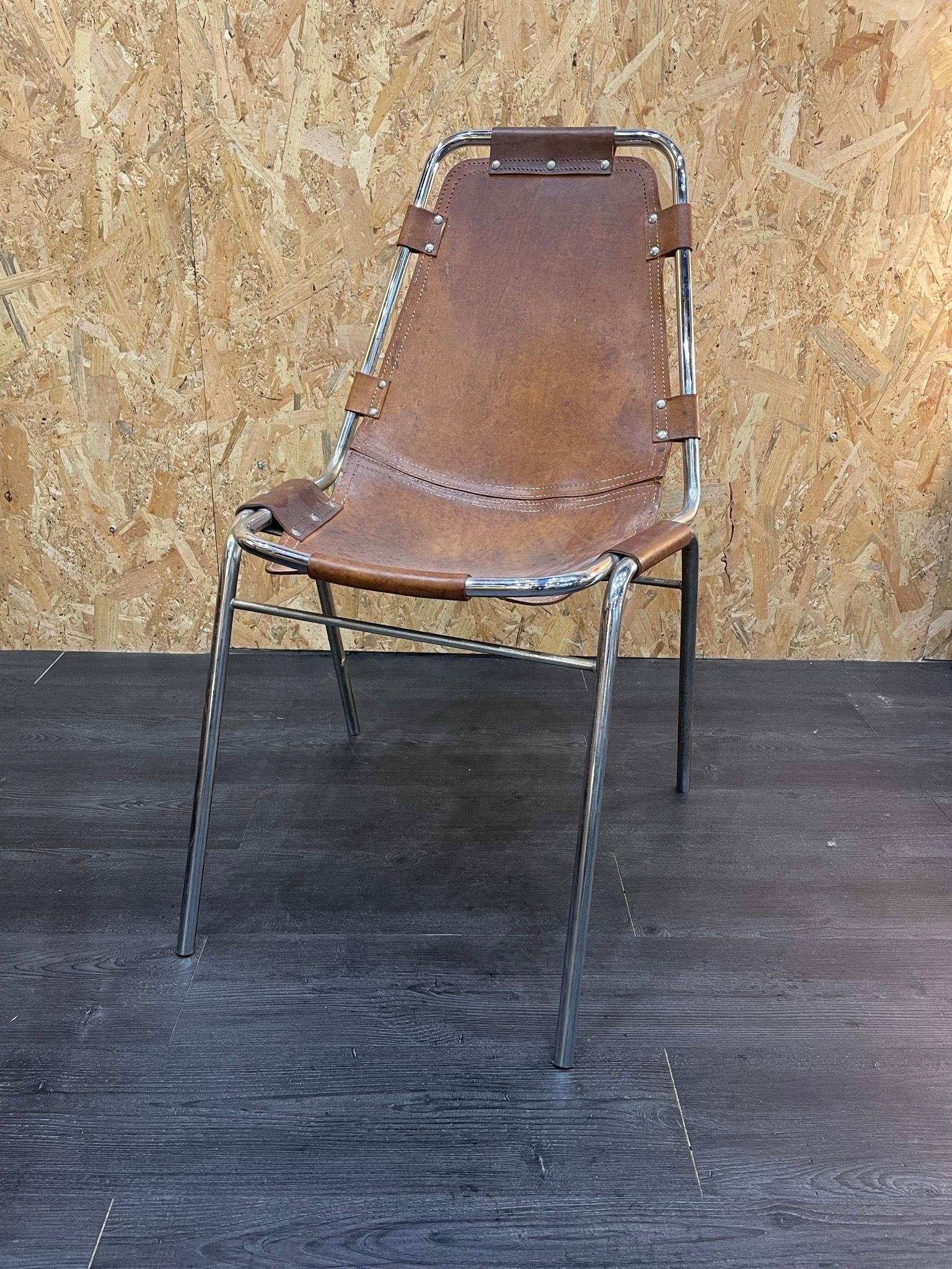 Charlotte Perriand 
6 chairs for the resort of Les Arcs 
Cordoba leather suspended on a chromed tubular metal frame.
Circa 1960
W 46 x D 55 x H 81 cms
Beautiful period condition
Emblematic model of the resort designed by the famous architect 
5400