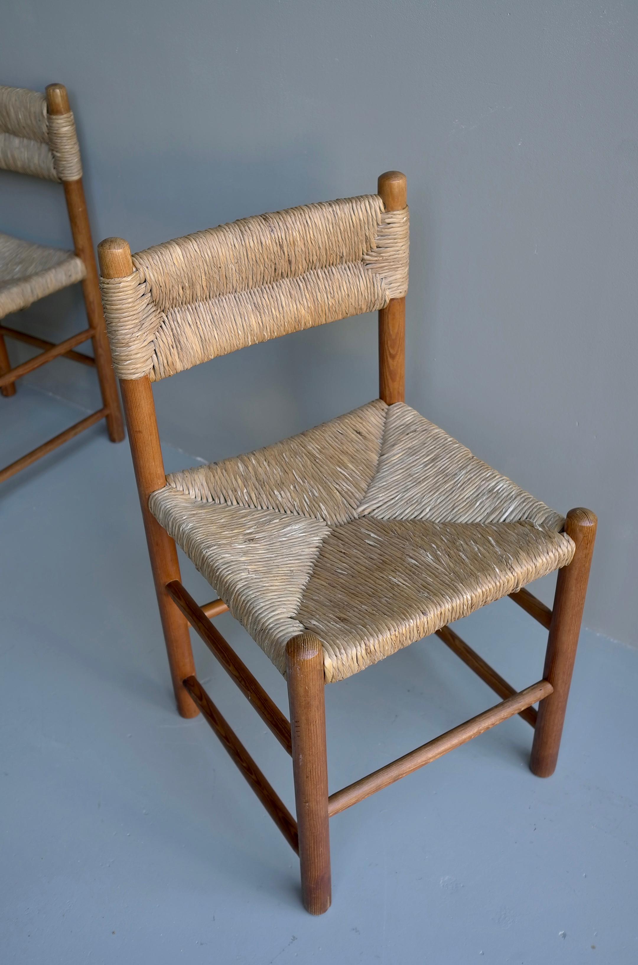 Mid-20th Century Charlotte Perriand, Set of Four Rush and wood 