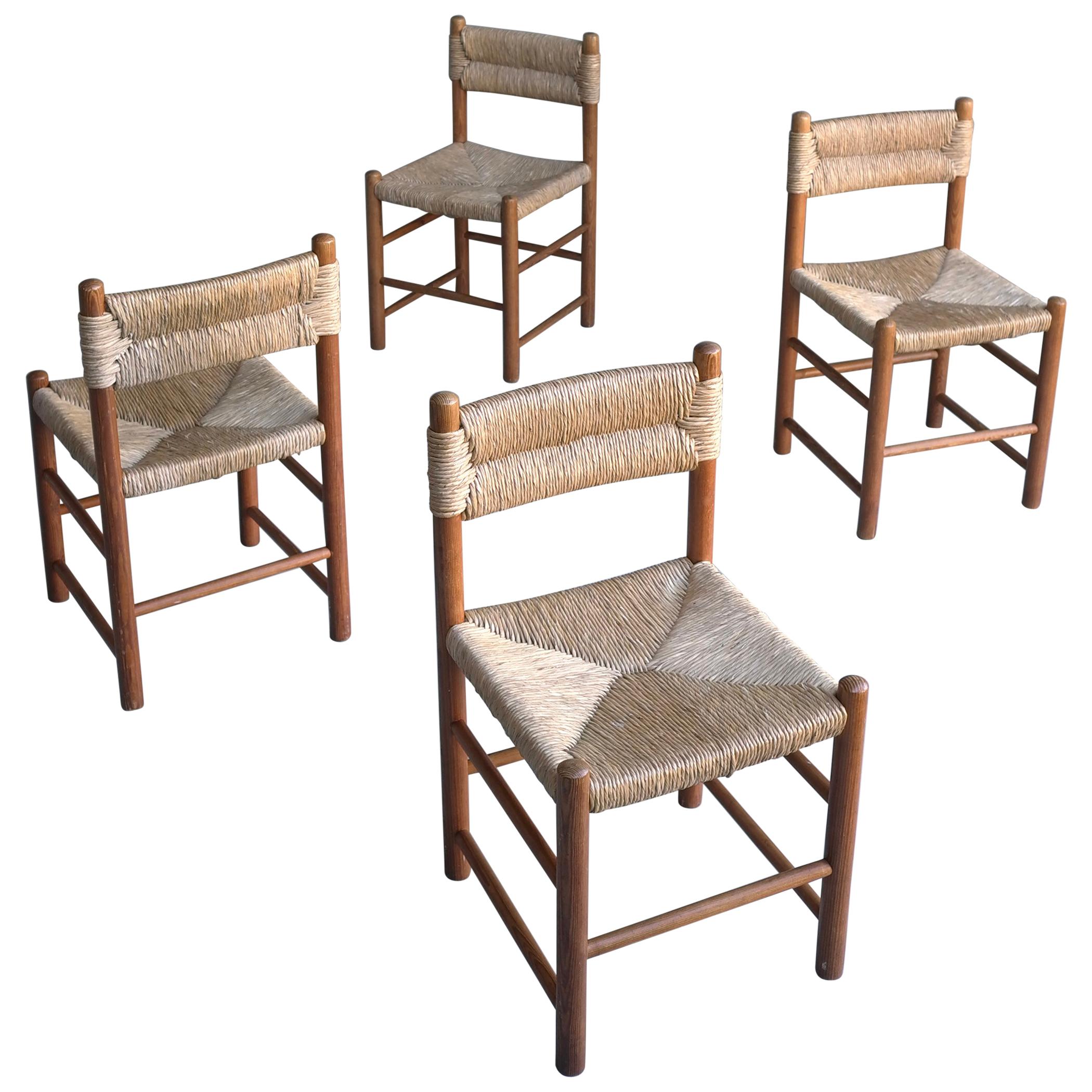 Charlotte Perriand, Set of Four Rush and wood "Dordogne" Chairs, France, 1960s