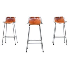 Charlotte Perriand set of three bar stools in leather Les Arcs France 1960