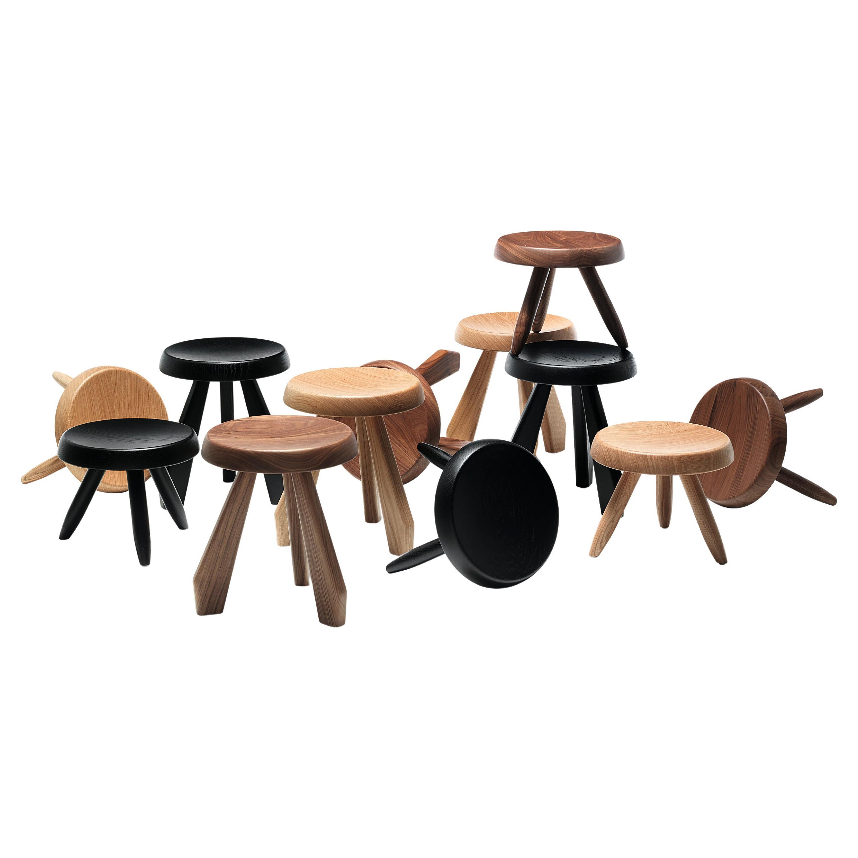 Ensemble de douze tabourets Berger et Meribel en bois de Charlotte Perriand par Cassina en vente