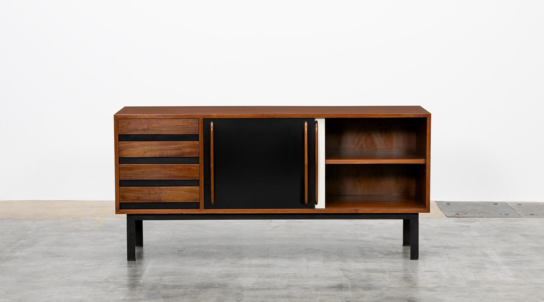 Sideboard, black and white laminate, corpus mahogany, Charlotte Perriand, France 1958.

Beautiful and really rare Charlotte Perriand sideboard edited by Steph Simon. This piece is made out of mahogany and comes with four drawers and two laminate