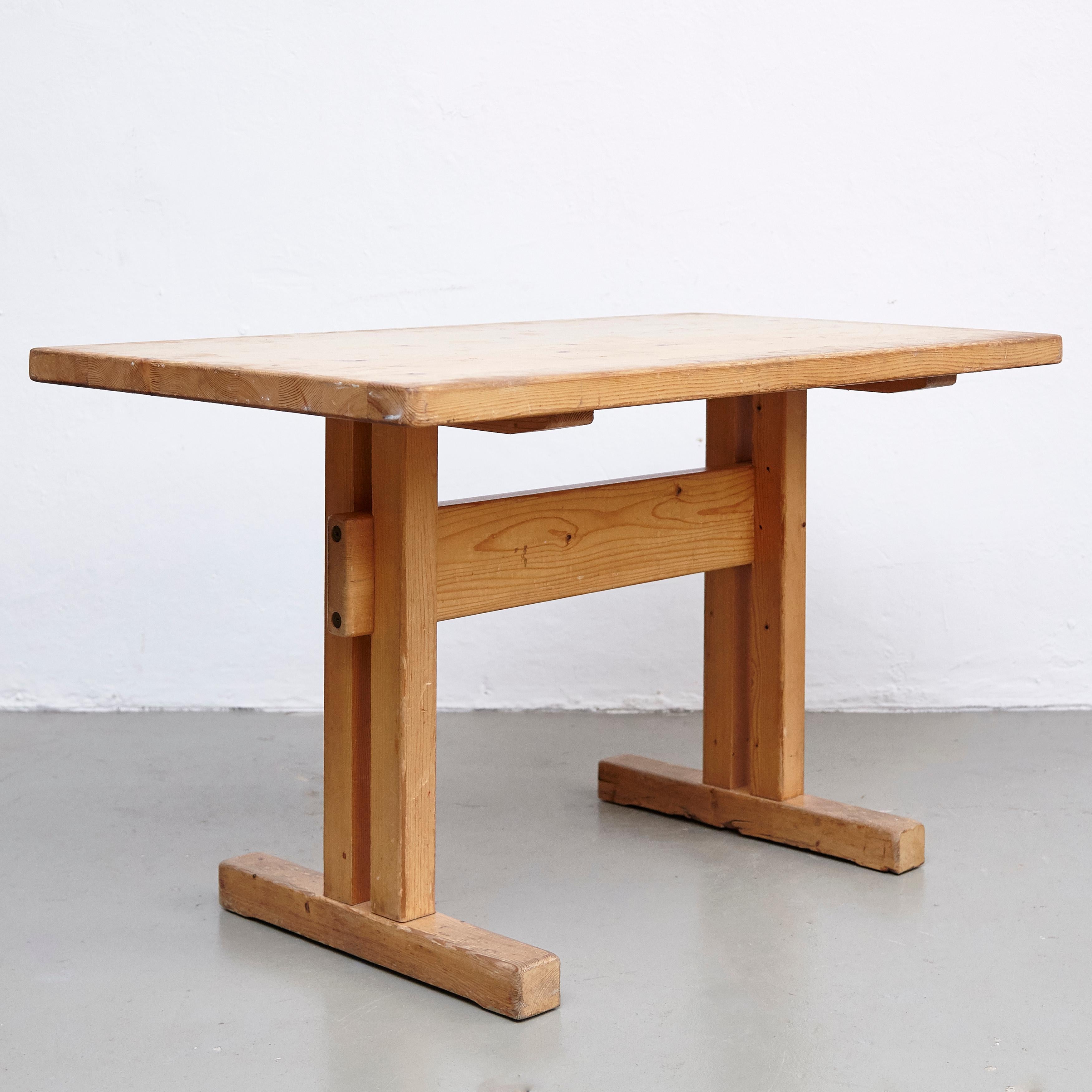 Table designed by Charlotte Perriand for Les Arcs ski resort, circa 1960, manufactured in France.
Pinewood.

In original condition, with wear consistent with age and use, preserving a beautiful patina.

Measures: 80 W x 67.5 D x 71 H cm.

Charlotte