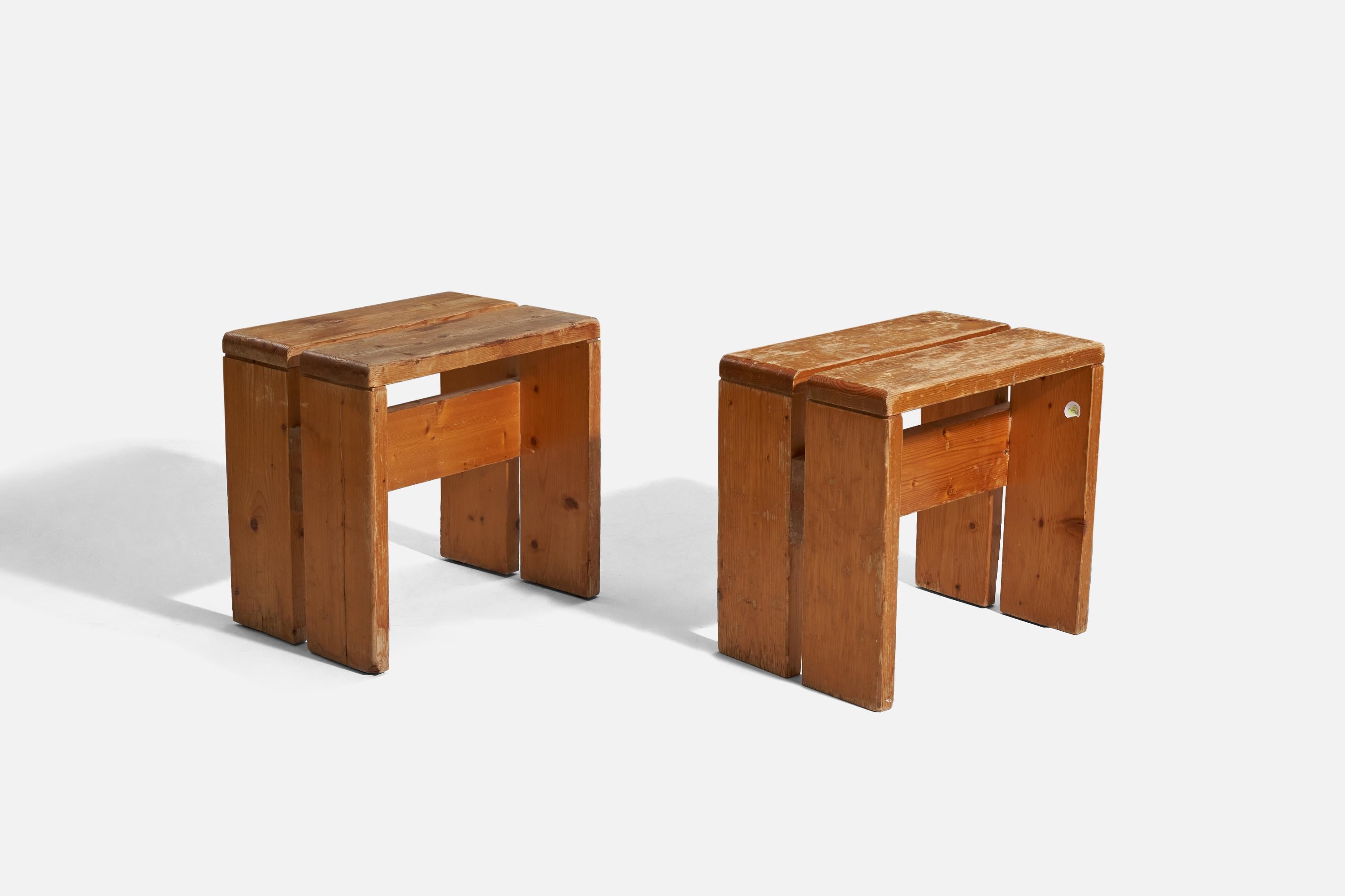 A pair of pine stools, designed and produced by Charlotte Perriand, France, 1968. Designed for Les Arcs ski resort.