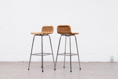 Pair of Charlotte Perriand Style Rattan and Chrome Bar Stools