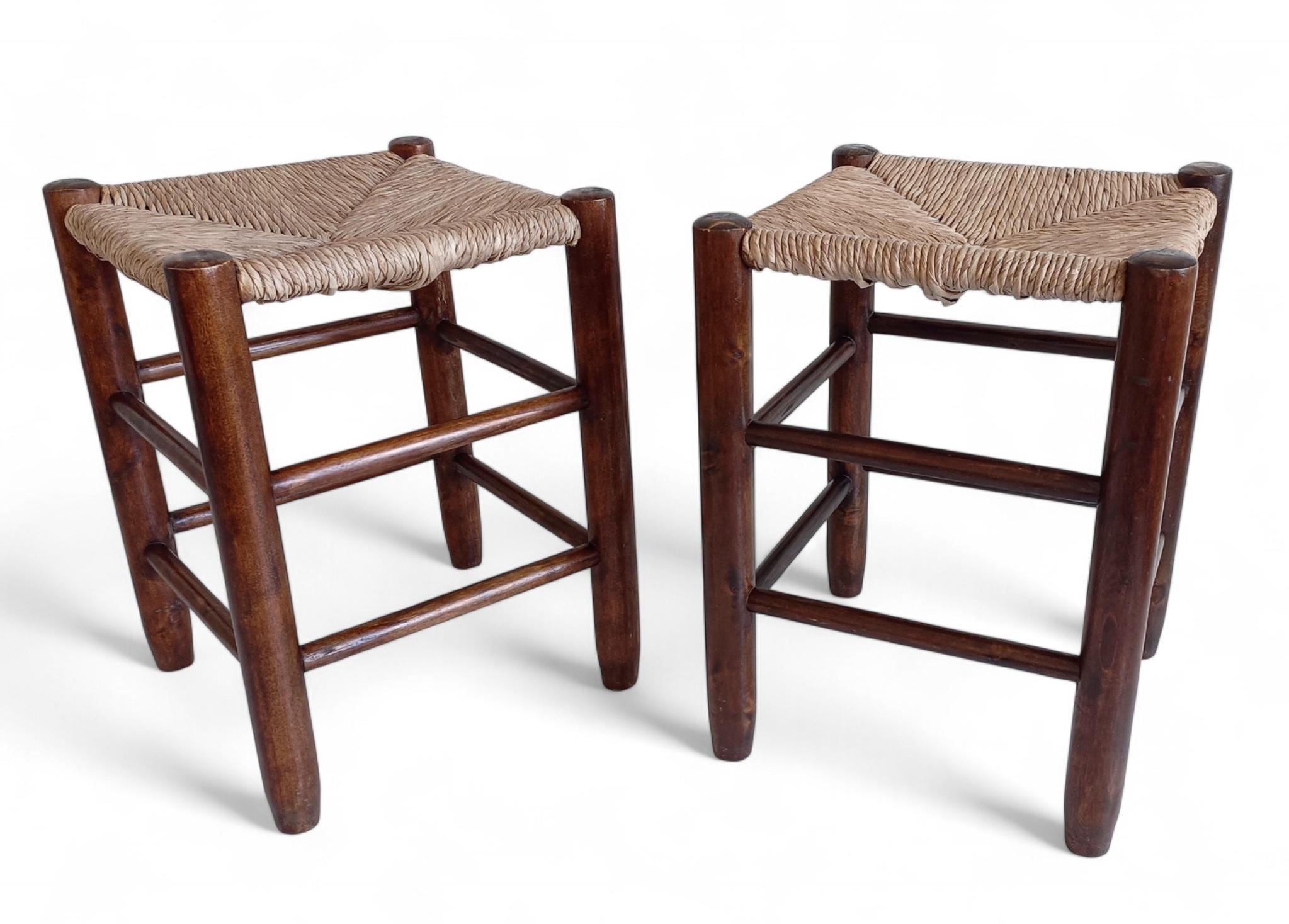 Hand-Crafted Charlotte Perriand Style, Pair of Rustic Wood and Straw Stools, France, c. 1950s For Sale