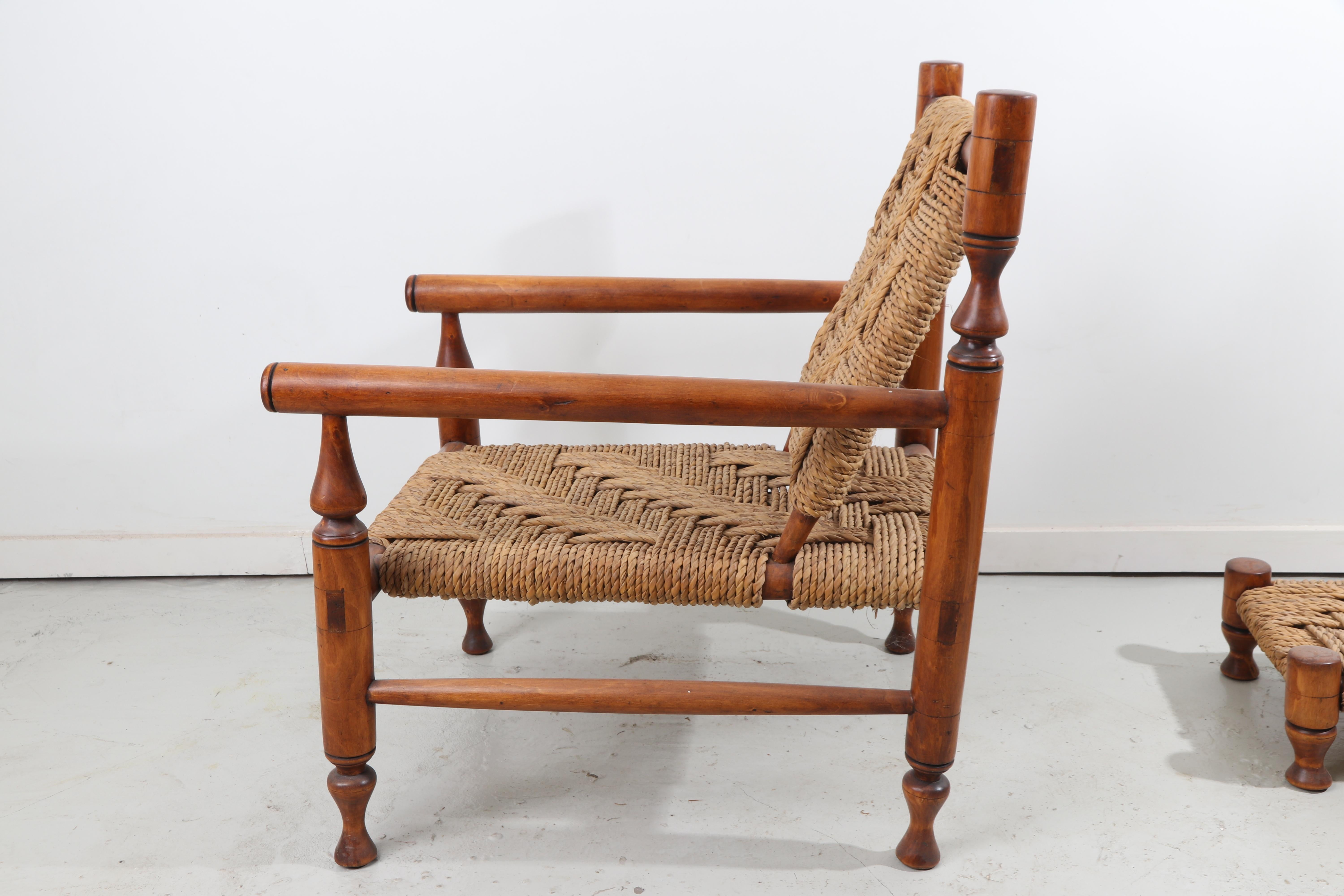 Beautifully crafted easy chair in the manner of Charlotte Perriand with a matching pair of foot stools or children's seats. The frame is made of ashwood and the seats and back rests are woven sisal rope. The chairs have a beautiful patina, are very