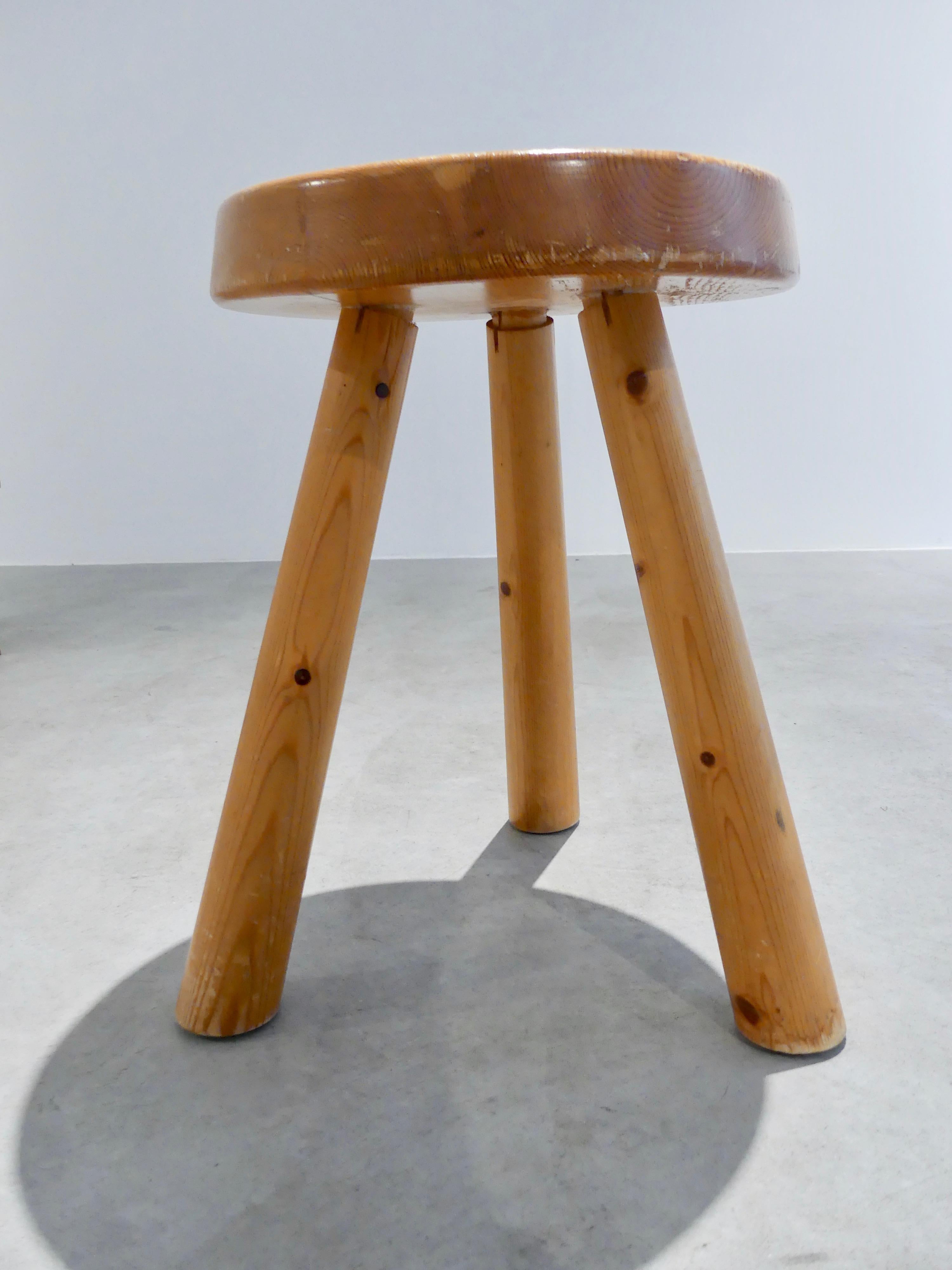 Tripod stools, made of pinewood, from the 1950s.
Charlotte Perriand from Les Arcs

Several stools in stock.