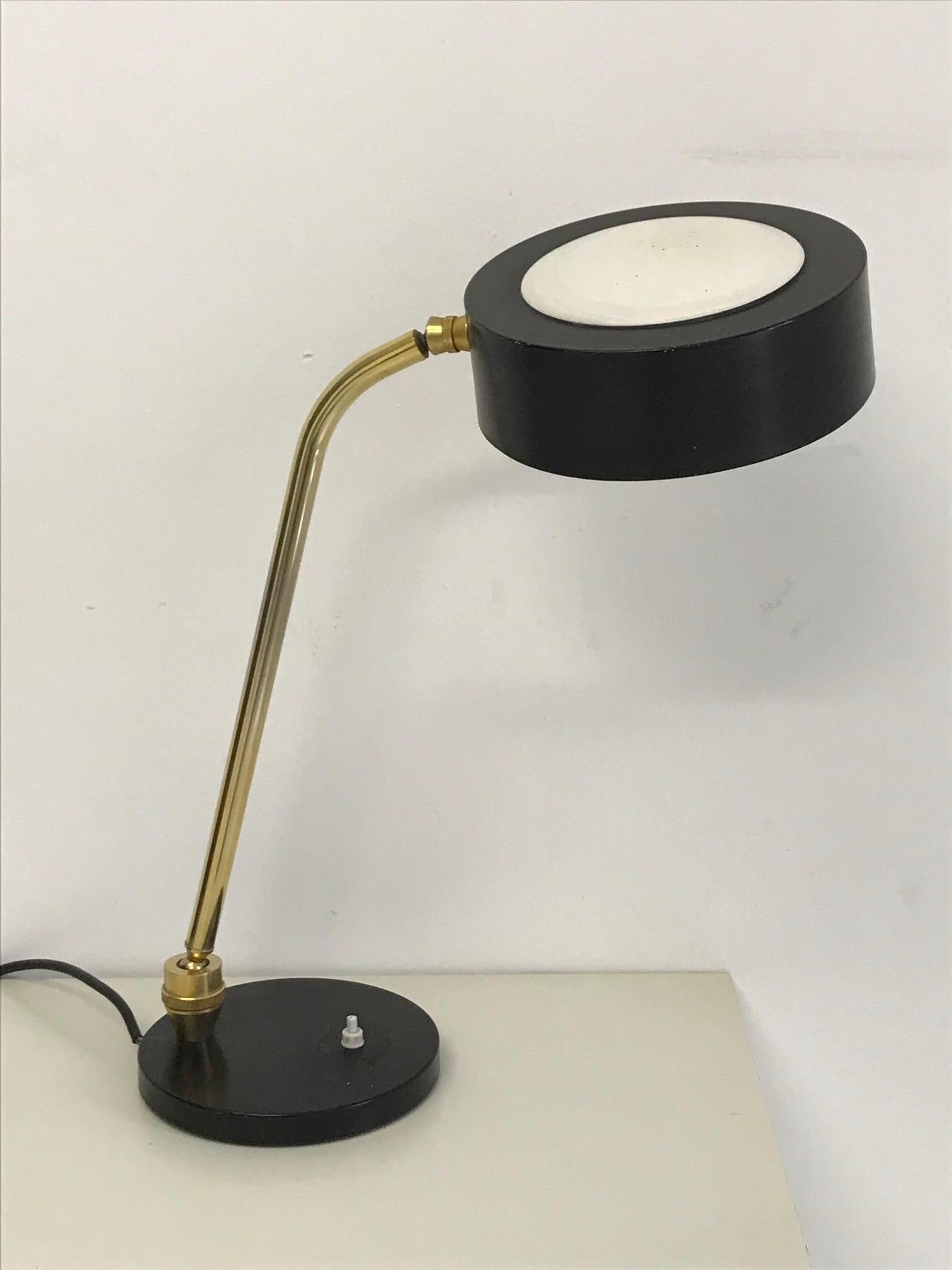 Charlotte Perriand vintage table lamp, made of lacquered metal and golden brass.