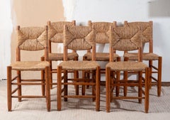 6 chaises « Bauche » N19 de Charlotte PERRIAND, en chêne et jonc, 1950