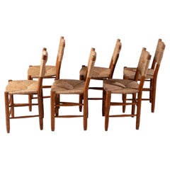 6 chaises « Bauche » N19 de Charlotte PERRIAND, en chêne et jonc, 1950