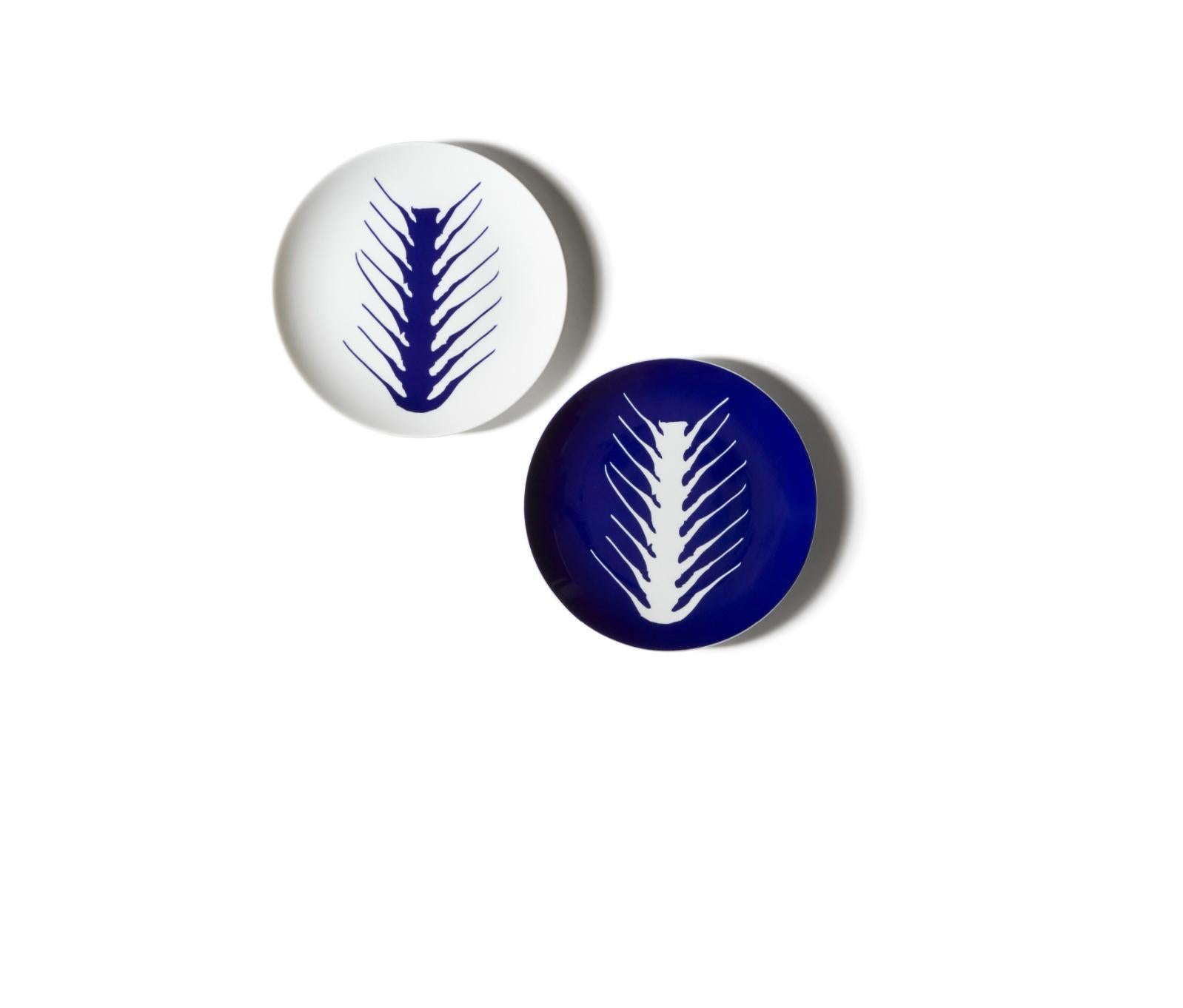 Charlotte Prerriand Set of Two Flat Arete Plates For Cassina

The exclusivity of a hand-decorated porcelain dinnerware service, based on ancient influences filtered through the modern sensibilities of an extraordinary pioneer of