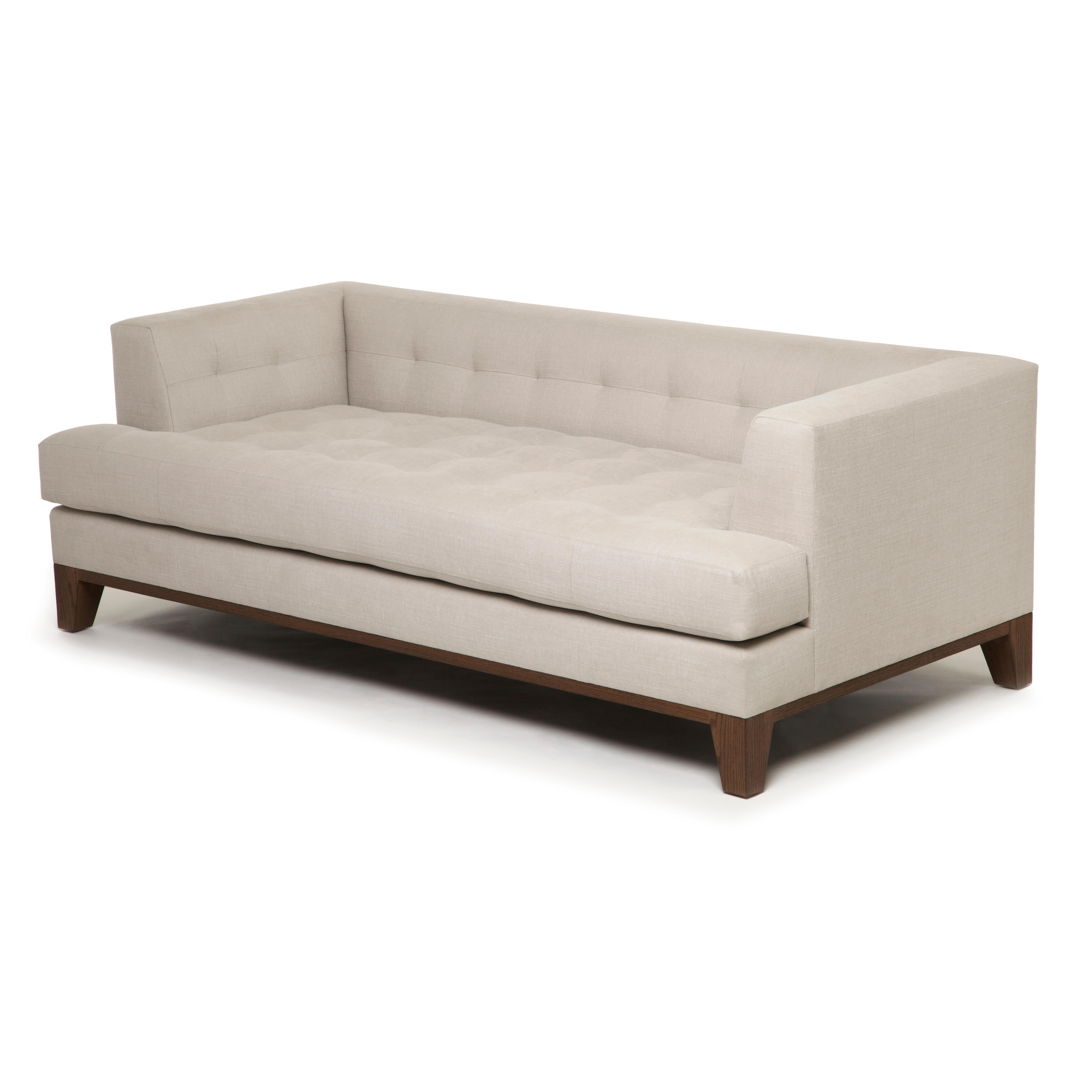 Chic and sophisticated, this sofa defines Naula’s Soho collection. With a low back and elegantly tufted seat, it is the intersection of modern and traditional.