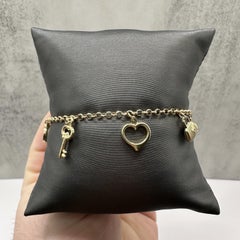 Braccialetto con charmi in oro giallo 14kt, regolabile, 7 8in, nuovo