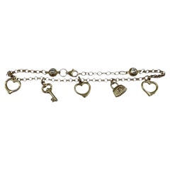 Braccialetto con charmi in oro giallo 14kt, regolabile, 7 8in, nuovo