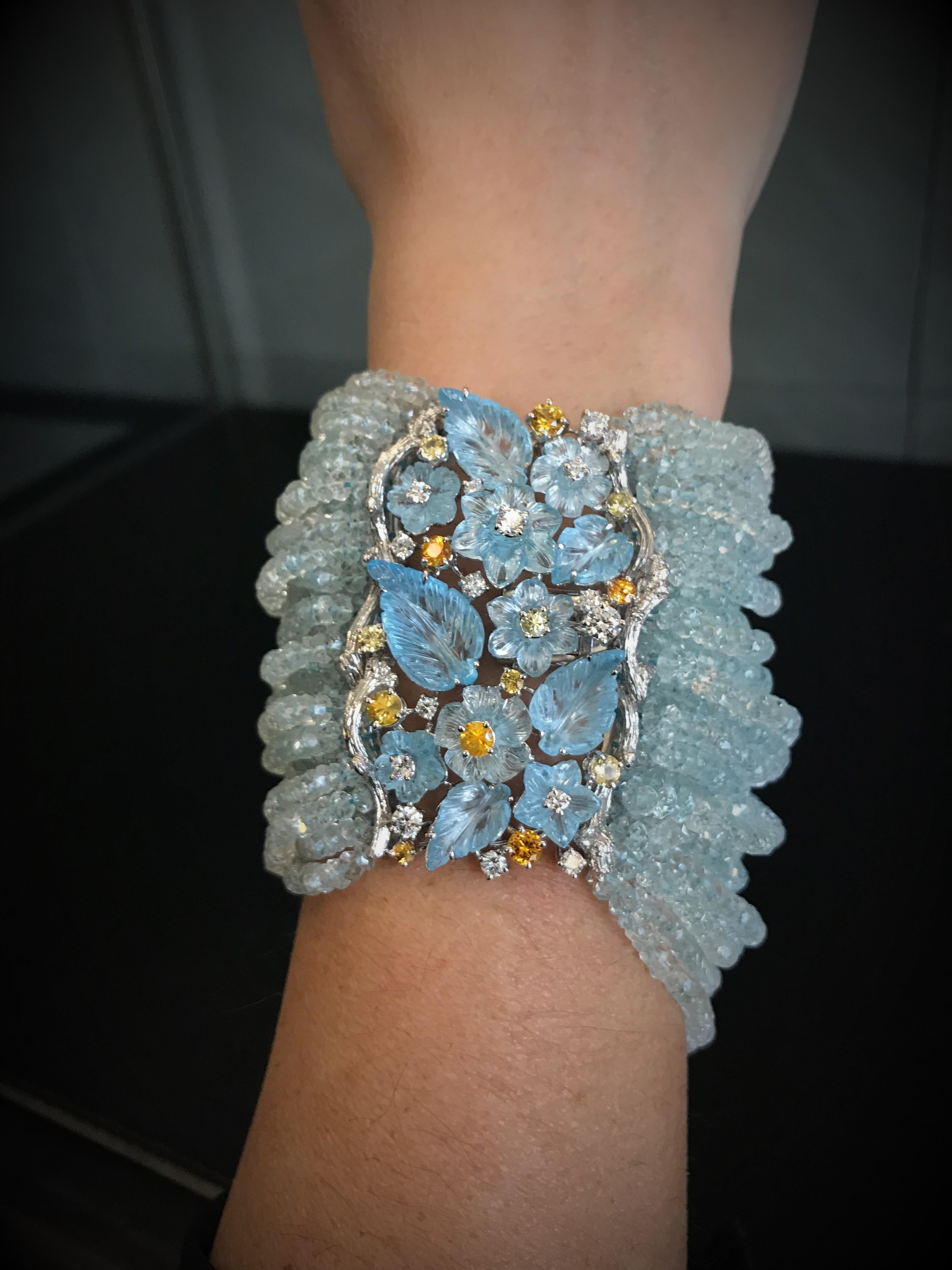 Contemporary Charm Bracelet 629.60 Carat Aquamarine Leaves 29.35 Carat Blu Topaz and Diamonds For Sale