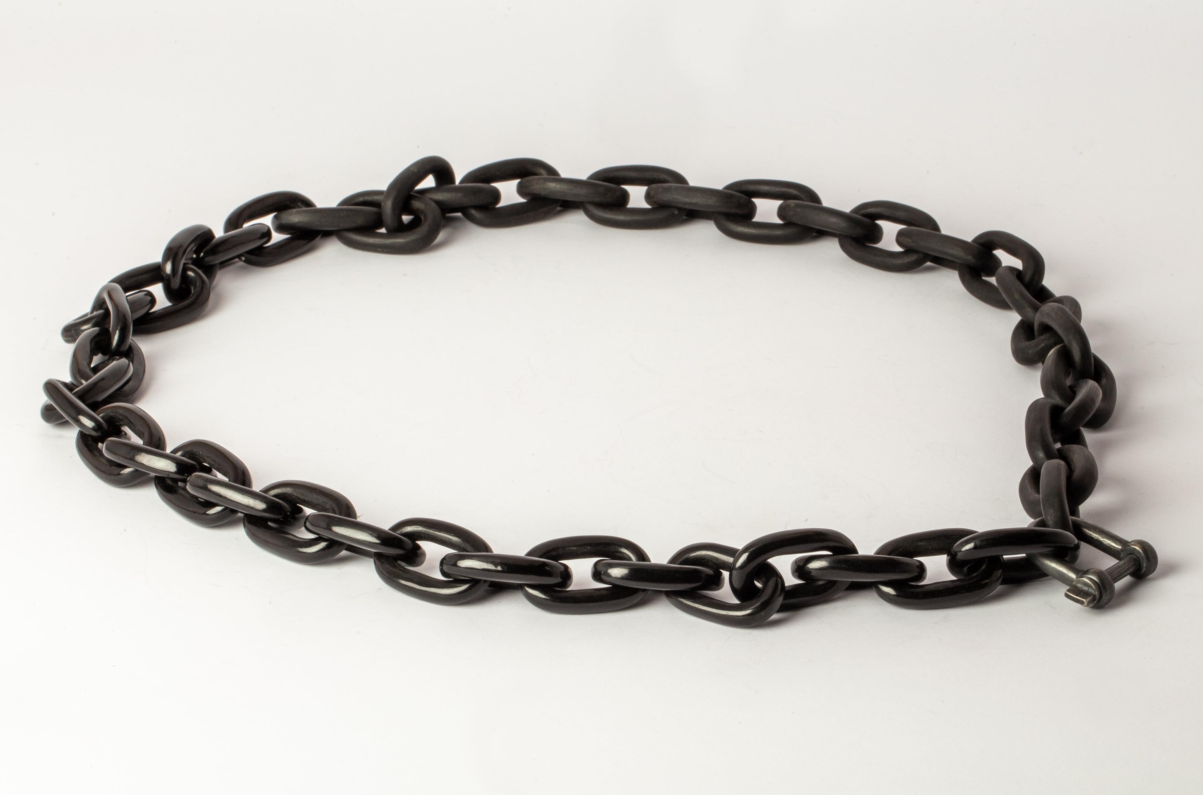 All organic chain is carved by hand. Chains made from horn are modeled and constructed into chain links
The Charm System is an interrelated group of products that can be mixed and matched or worn individually.
Chain link size (L × H): 33 mm × 22
