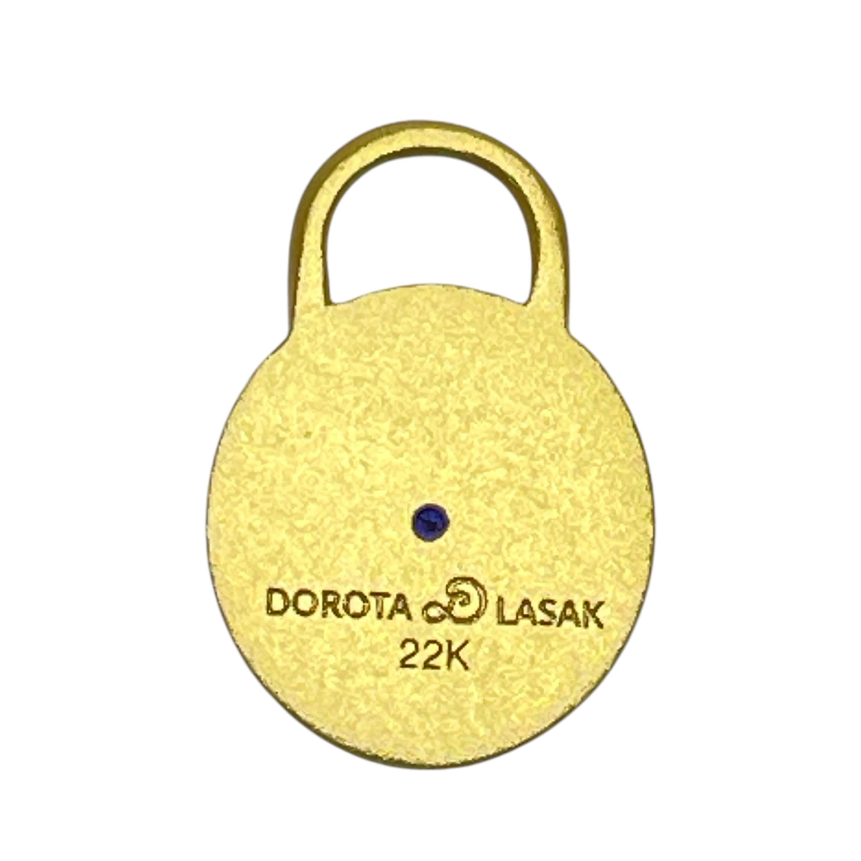 Charme rotondo con zaffiro in oro 22k

DETTAGLI

- Oro giallo 22k 

- zaffiro

- Dorota LASAK 22k

- solo charme

- 13.5mm