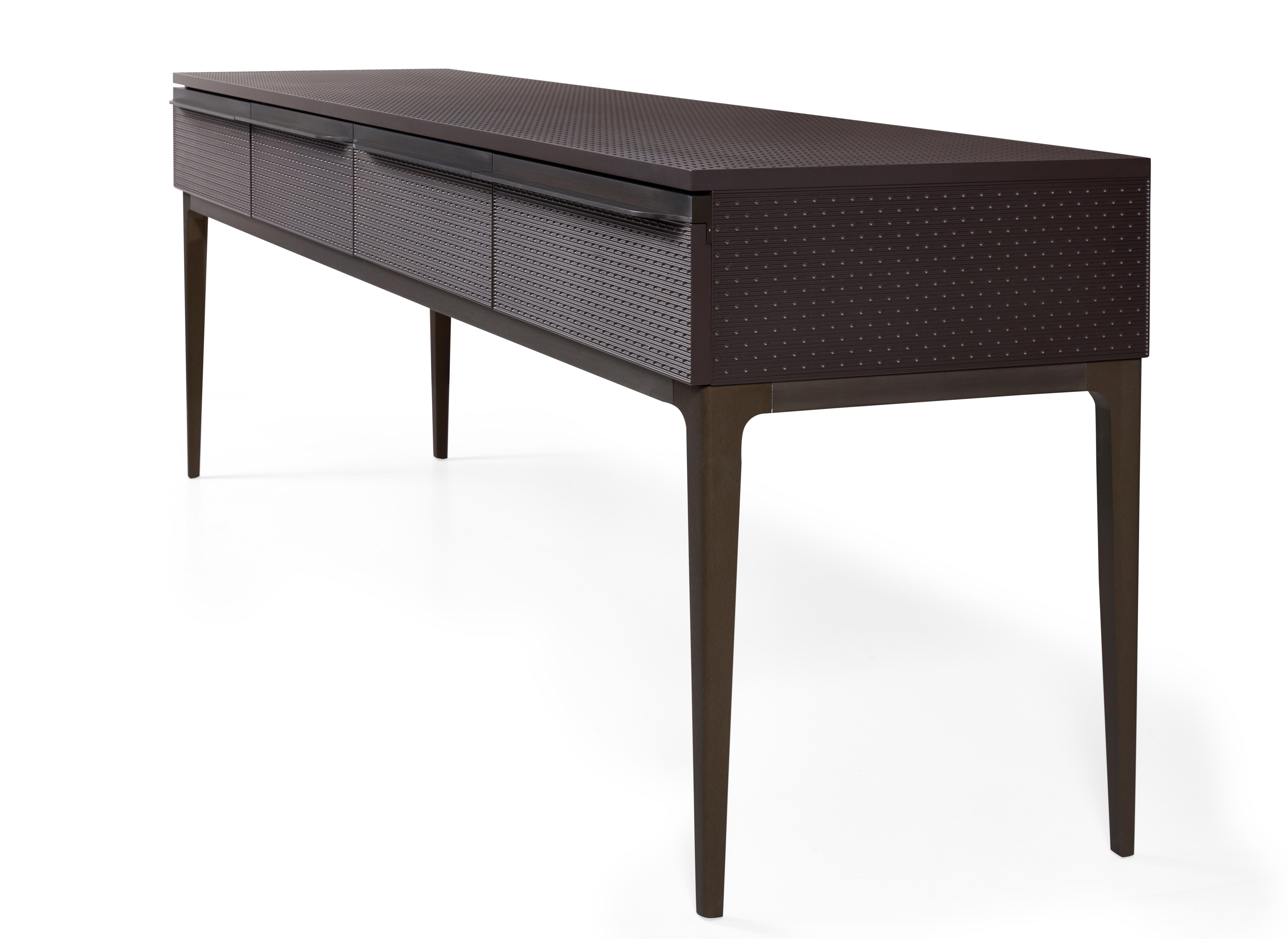 Adding to the charm of this collection, is a console that is as elegant as it is unassuming. The combination of wood, metal and lacquer allow for endless style possibilities, and open this console up for use in almost any room.