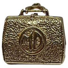 14 kt gold doctor's case charm.