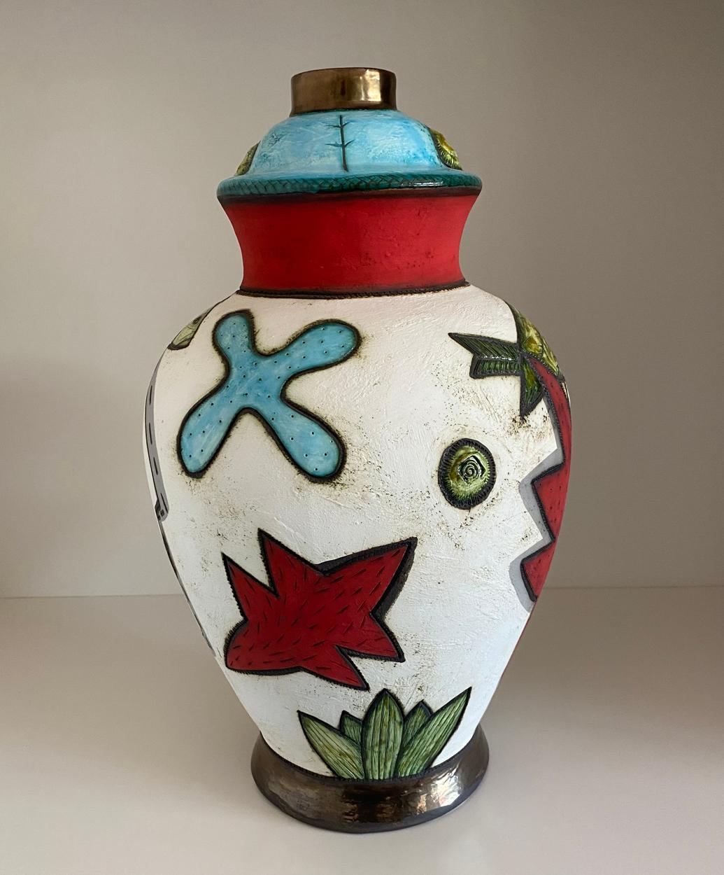 A major piece - large pottery vase by widely collected South African ceramicist Charmaine Haines, produced 2020.


Charmaine Haines was born in 1963 in Grahamstown and trained under Hylton Nel at the Port Elizabeth Technikon and obtained a Higher