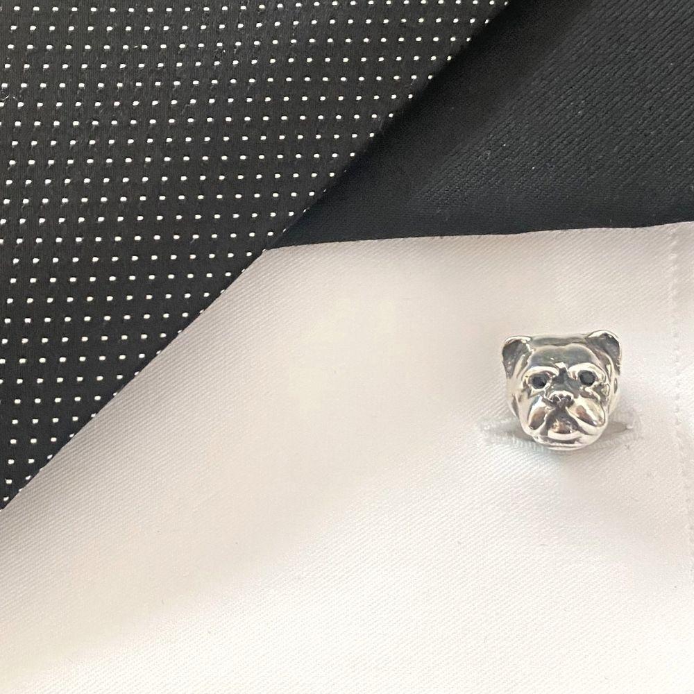 Finely detailed Dog Cufflinks in Recycled Sterling Silver.

No bones about it! Man’s best friend crafted from Recycled Sterling Silver with Sapphire eyes. A must-have for all dog lovers, 
give the cuff links that everyone will bark about! Number one